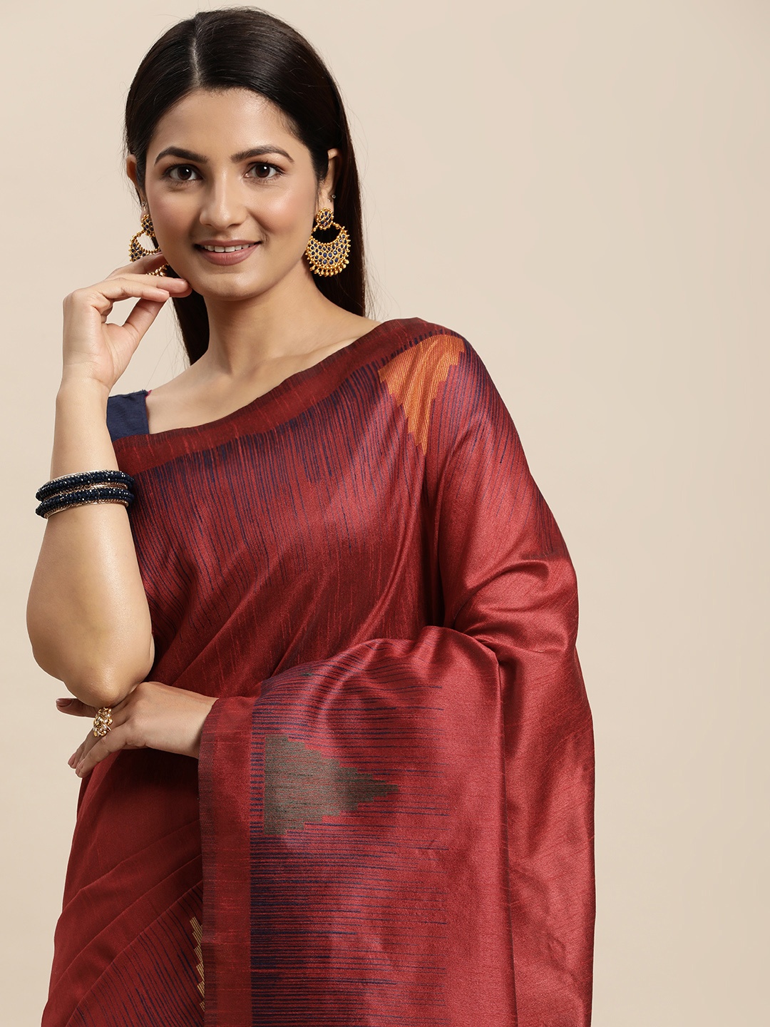 

AYKA CLOTHINGS Maroon & Navy Blue Woven Design Ikat Saree