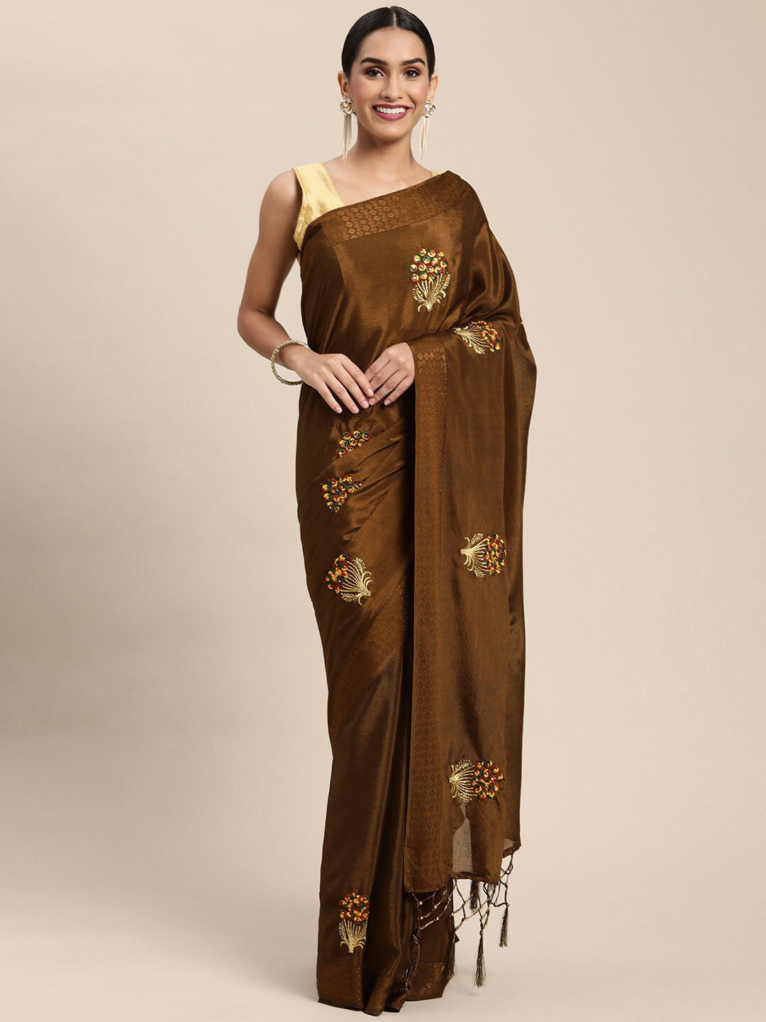 

HRITIKA Women Brown & Gold-Toned Floral Embroidered With Tessle Saree