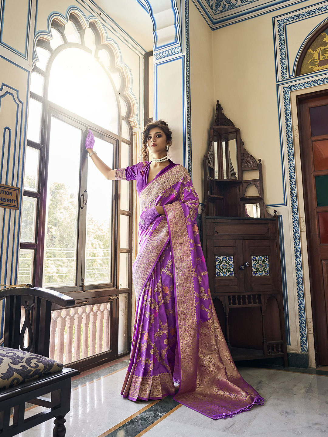 

Elora Purple & Gold-Toned Ethnic Motifs Zari Silk Blend Banarasi Saree