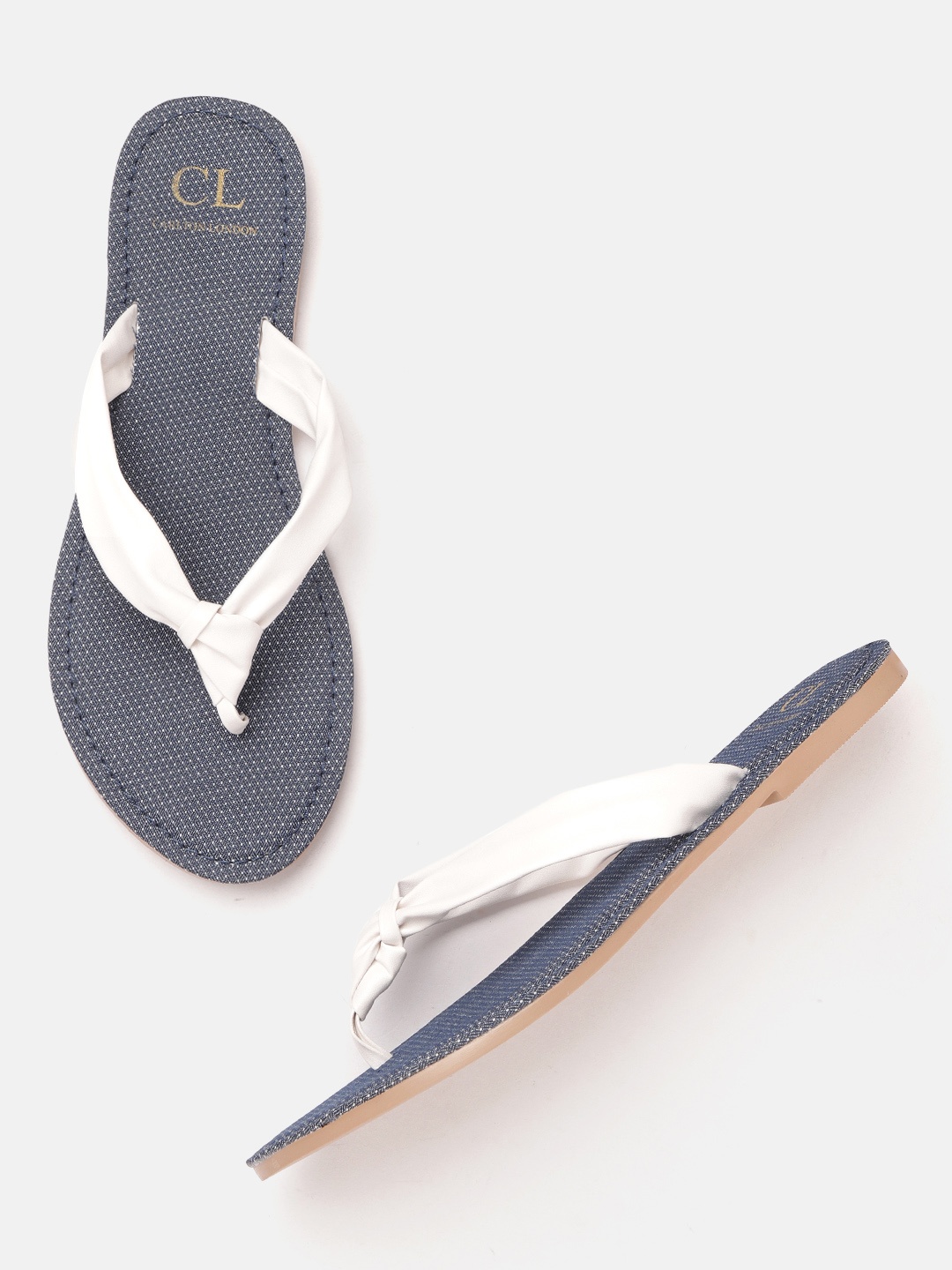 

Carlton London Women White Solid Knot Detail Flats