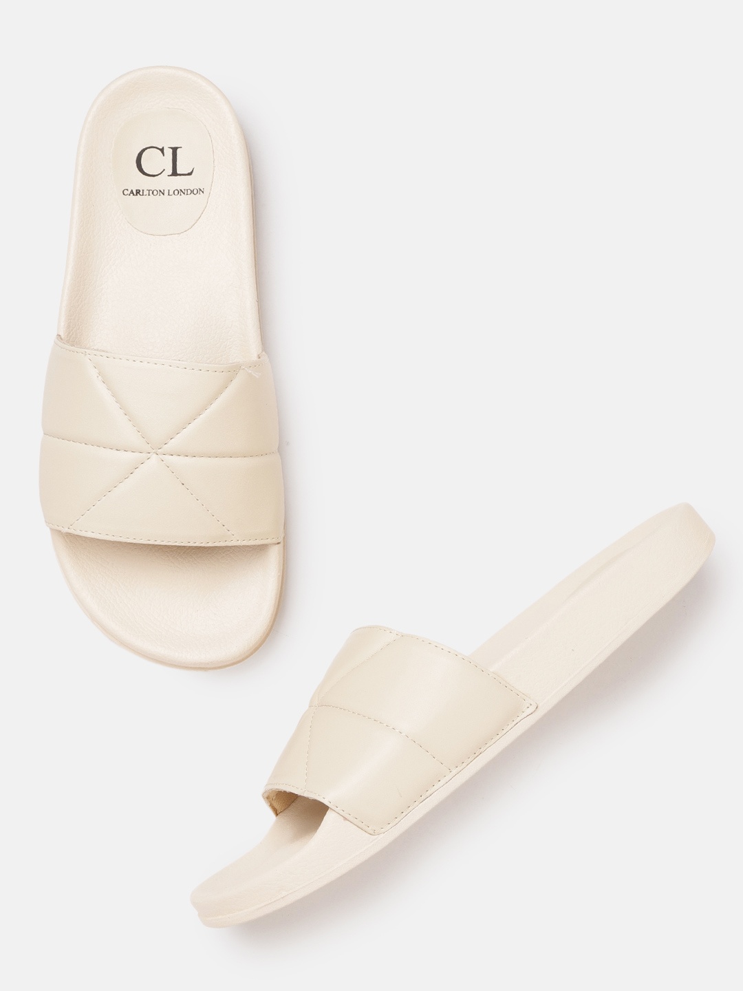 

Carlton London Women Beige Solid Sliders