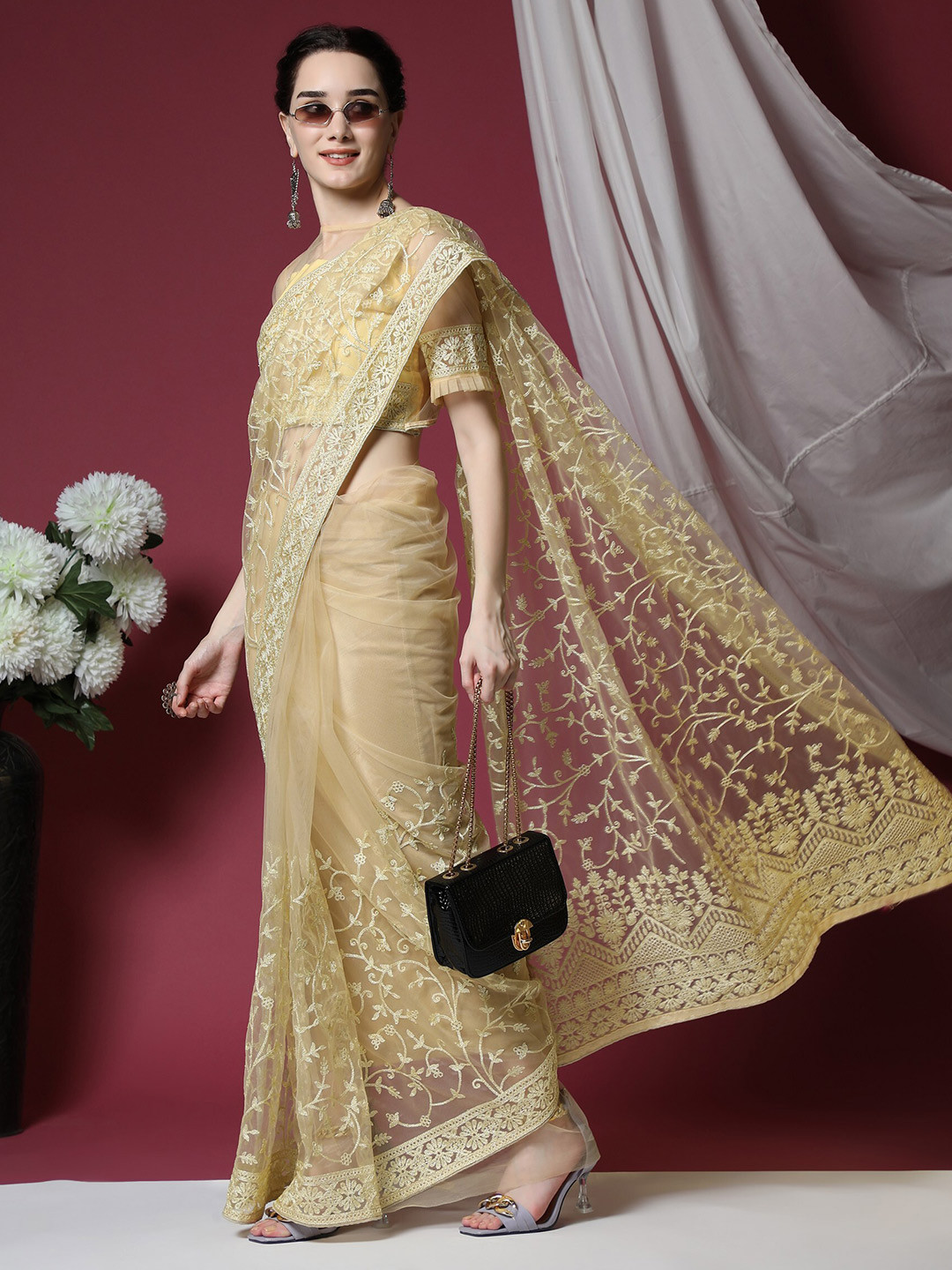 

ORUS Yellow Floral Embroidered Net Saree
