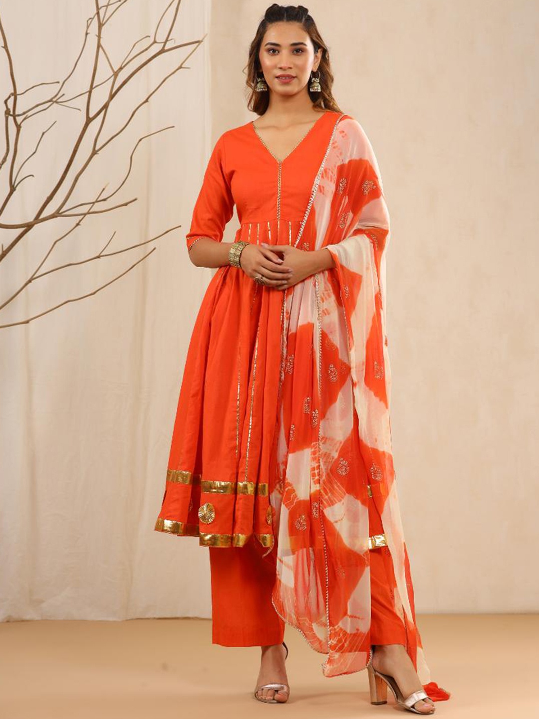 

Baisacrafts Women Orange Solid Gotapatti Work Pure Cotton Kurta With Trousers & Dupatta