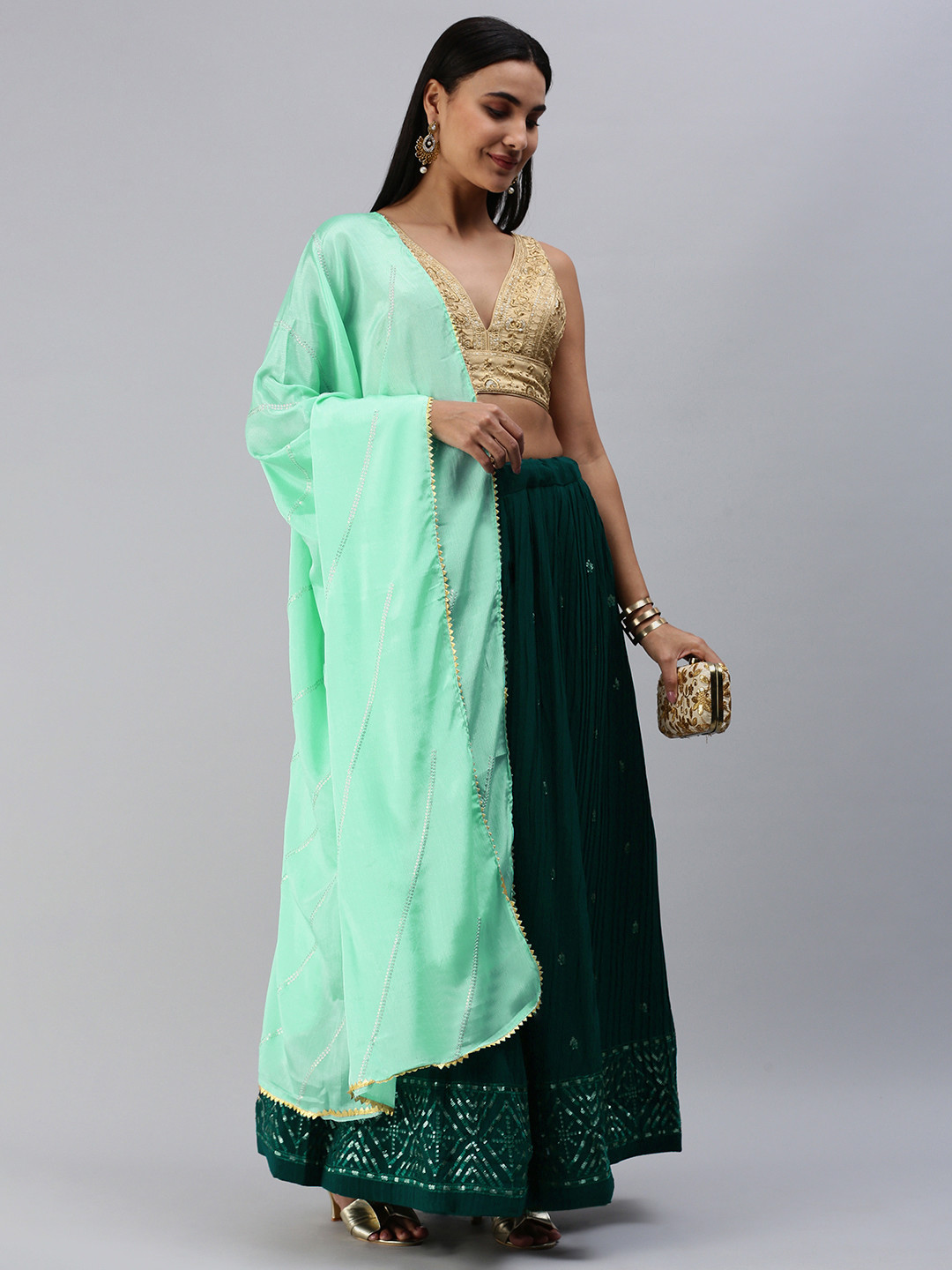 

Rani Saahiba Teal & Gold-Toned Embroidered Semi-Stitched Lehenga & Unstitched Blouse With Dupatta