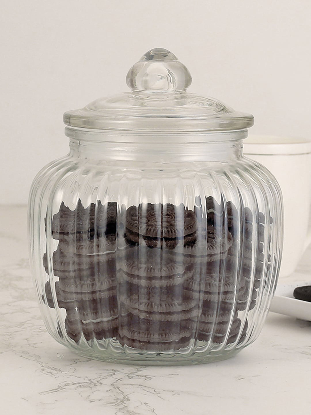 

HomeTown Transparent Textured Glass Jar with Lid