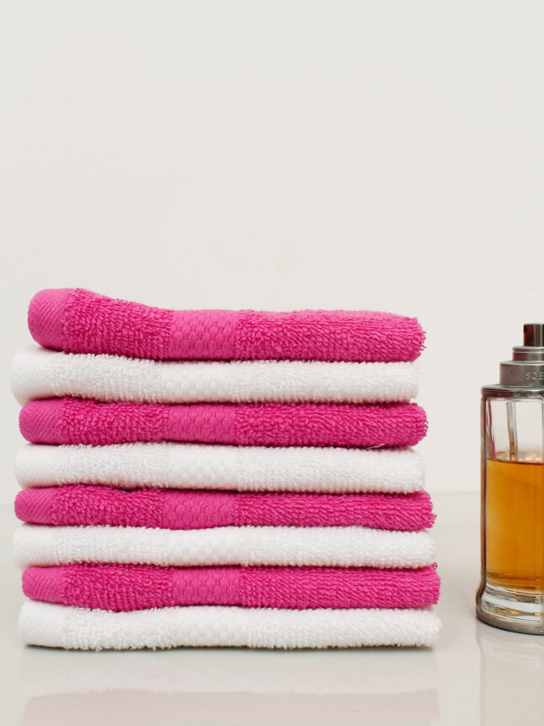 

AVI Living Set Of 8 White & Pink Solid 500 GSM Pure Cotton Face Towels