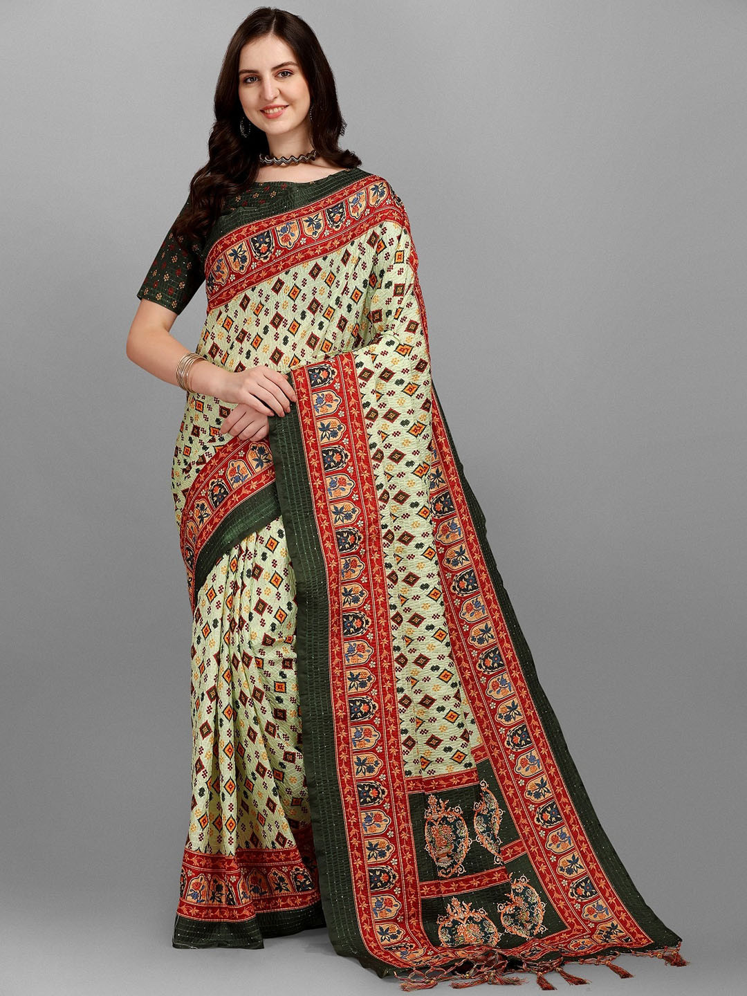 

Ethnic Yard Green & Red Ethnic Motifs Silk Blend Saree
