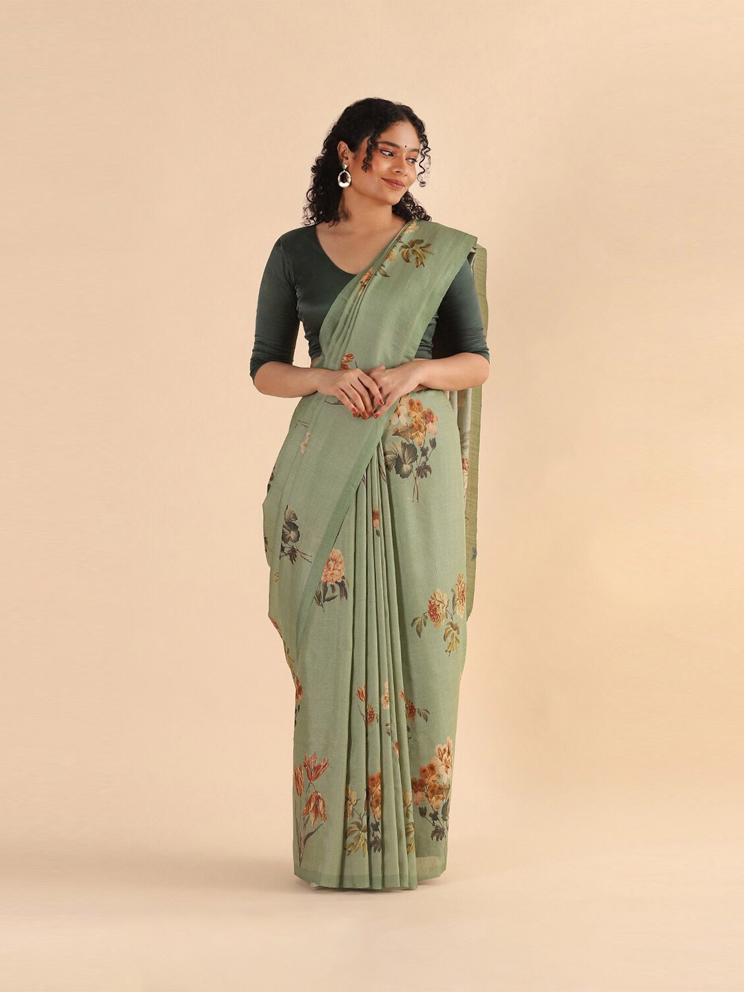 

Taneira Green & Brown Floral Pure Silk Tussar Saree