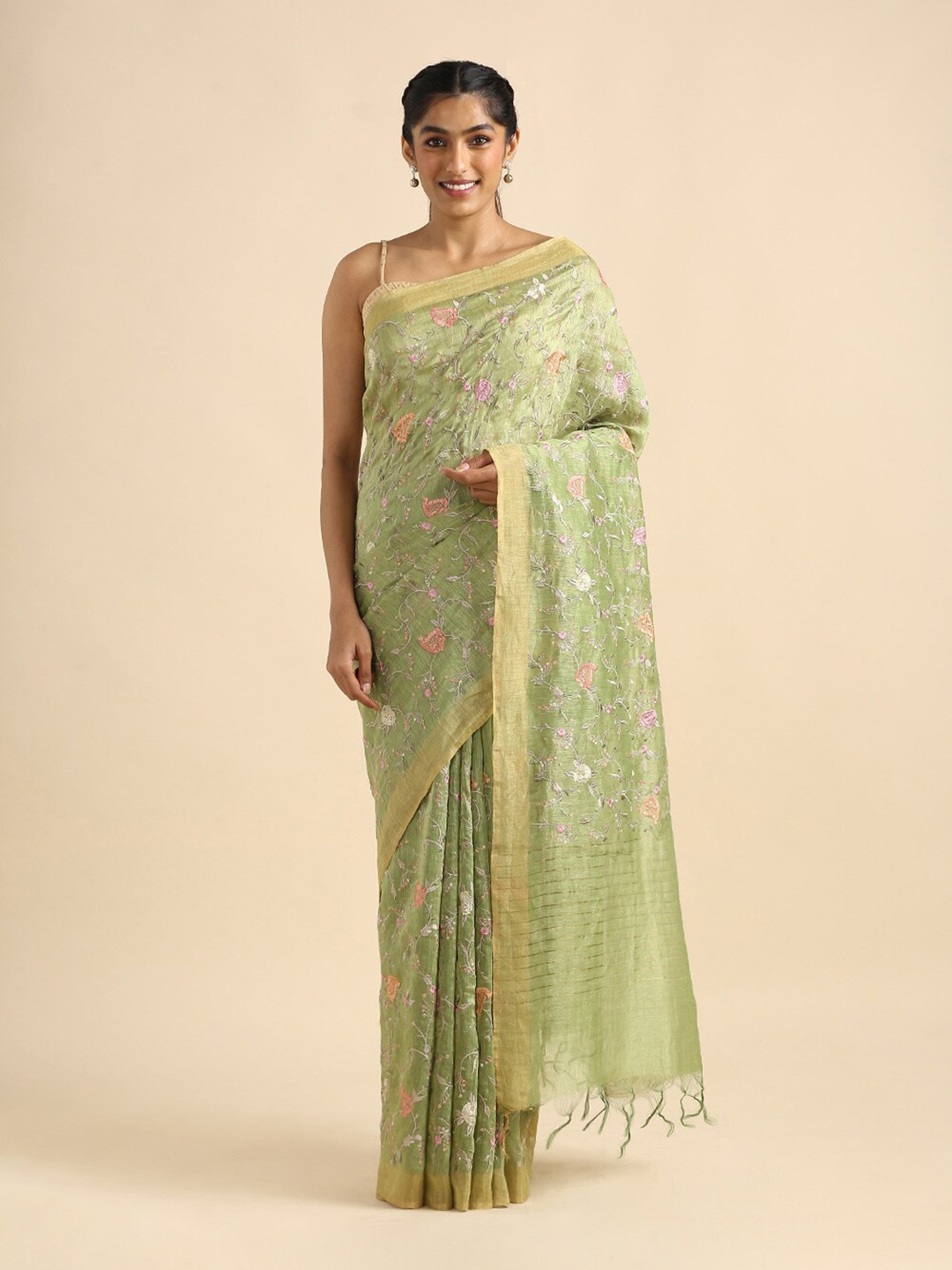 

Taneira Women Green & White Floral Embroidered Pure Linen Saree