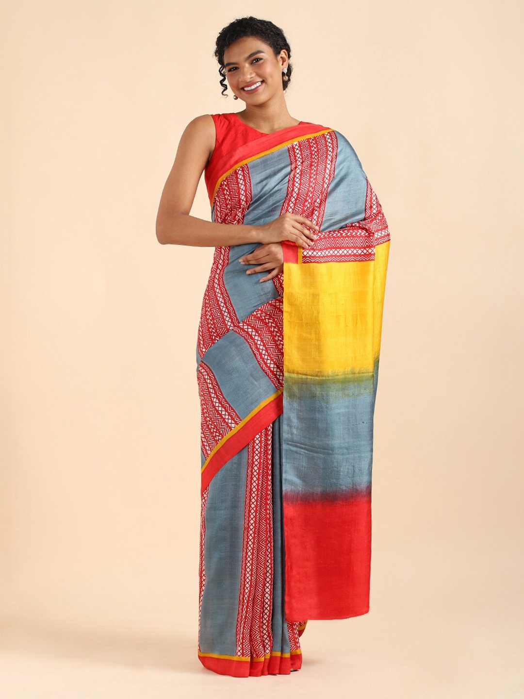 

Taneira Grey & Red Colourblocked Pure Silk Saree