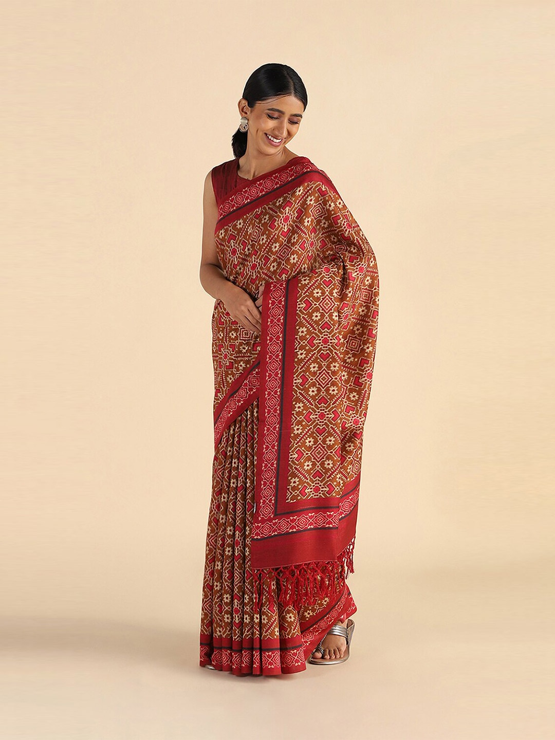 

Taneira Brown & Red Pure Silk Tussar Saree