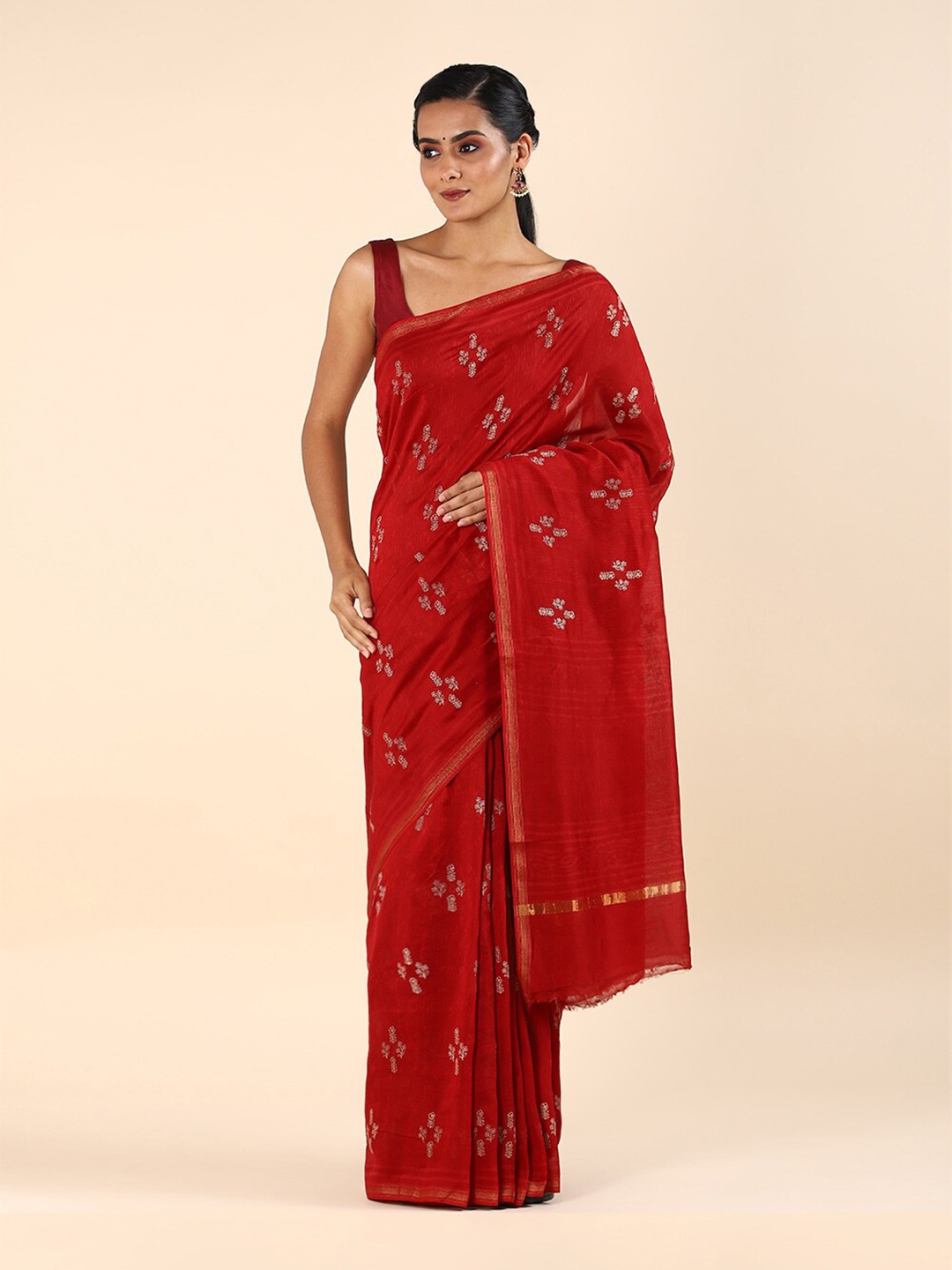 

Taneira Women Red & Gold-Toned Floral Zari Silk Cotton Saree