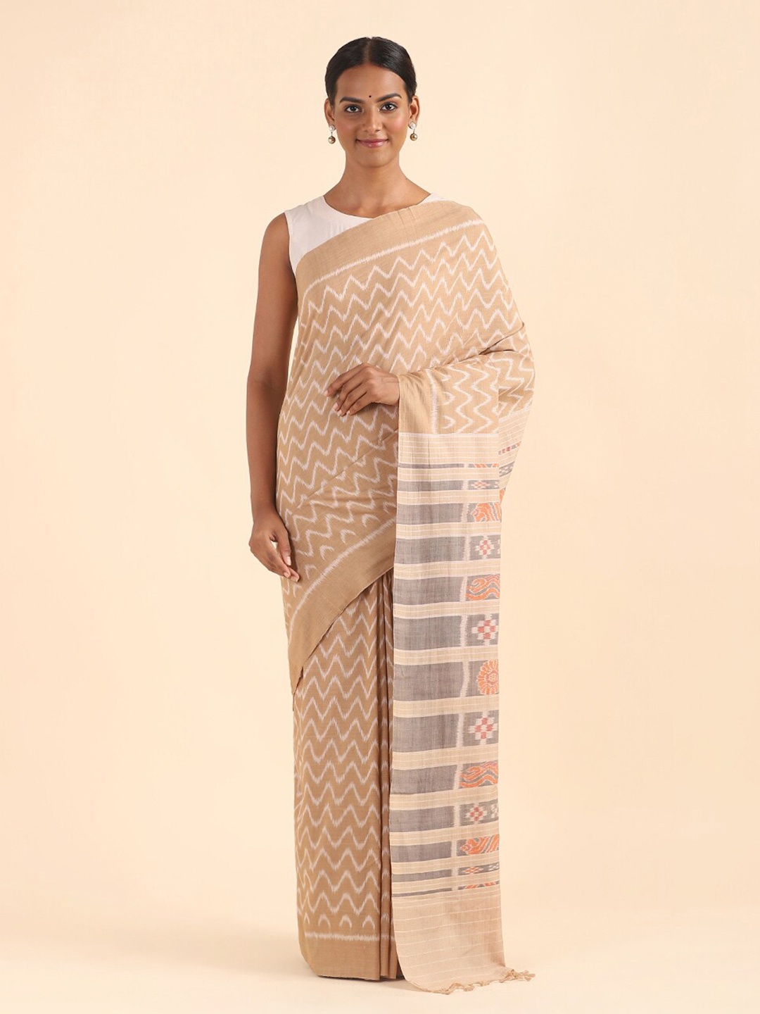 

Taneira Beige & Orange Pure Cotton Ikat Saree