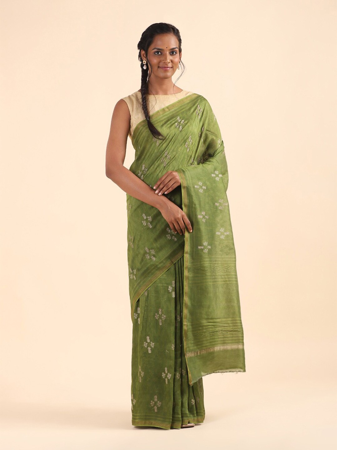 

Taneira Women Green & Gold-Toned Floral Thread Work Zari Silk Cotton Saree