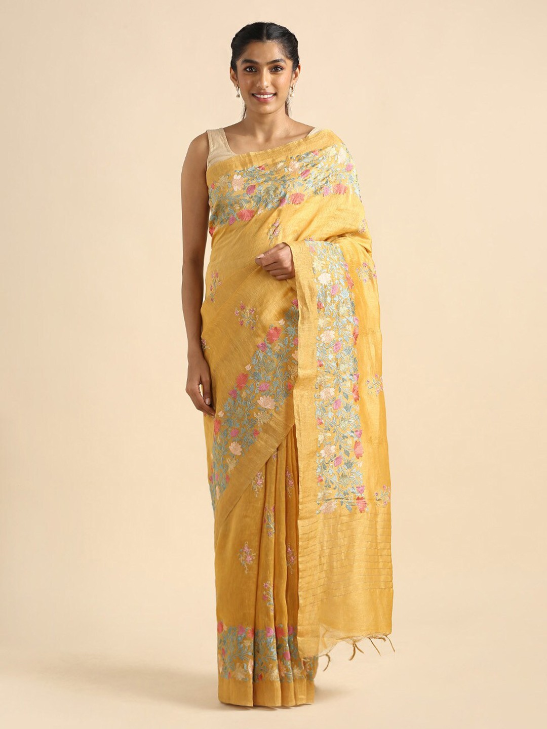 

Taneira Yellow Floral Embroidered Pure Linen Saree