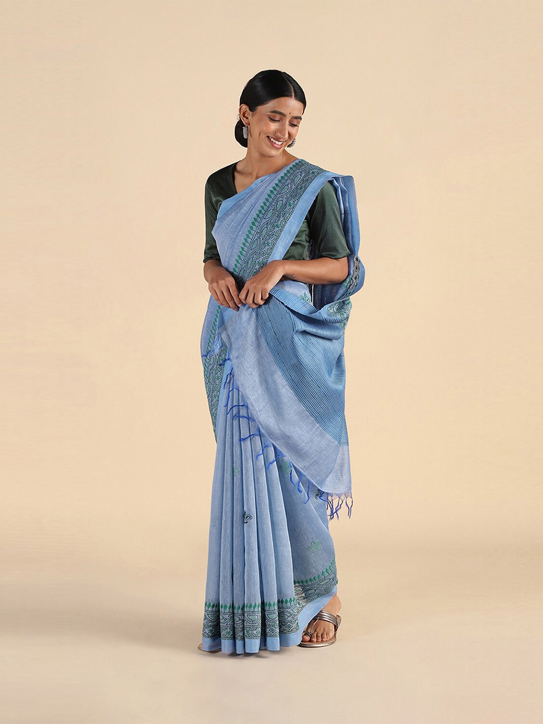 

Taneira Women Blue & Black Embroidered Pure Linen Saree