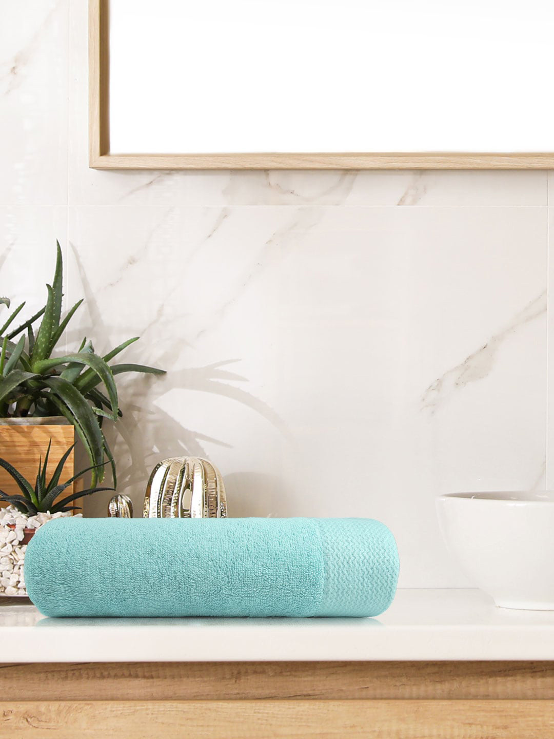 

Trident Turquoise Blue Solid 500 GSM Pure Cotton Bath Towel