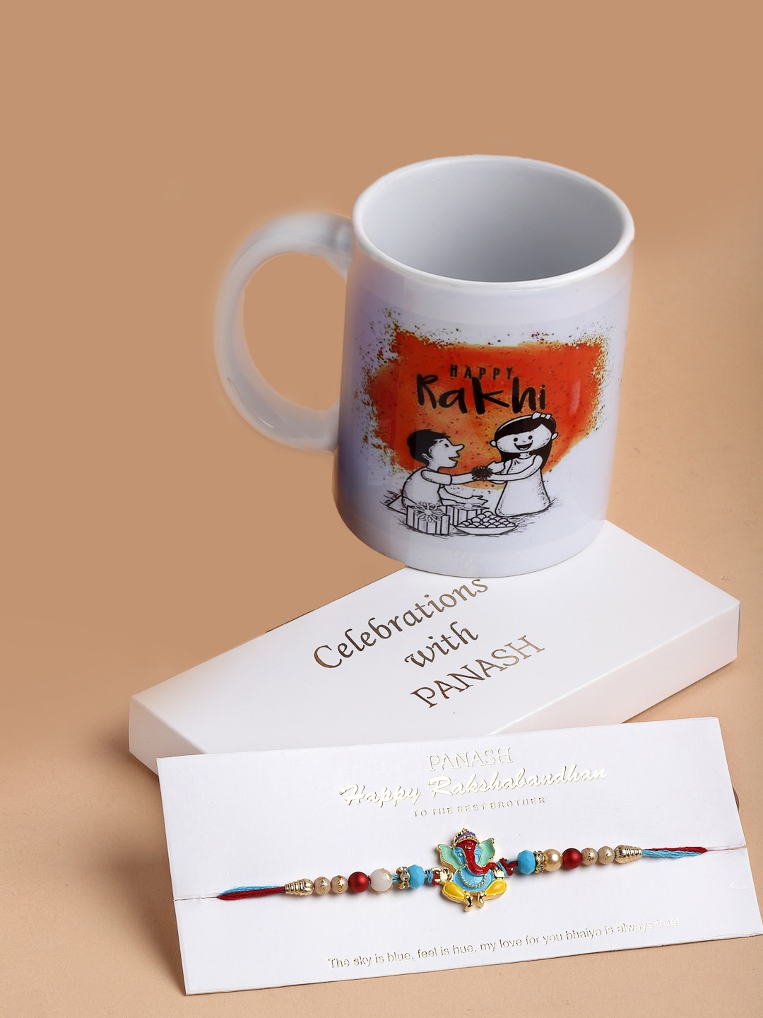 

PANASH Men Multicoloured God Ganesh Beaded Rakhi with Mug Gift Set, Multi