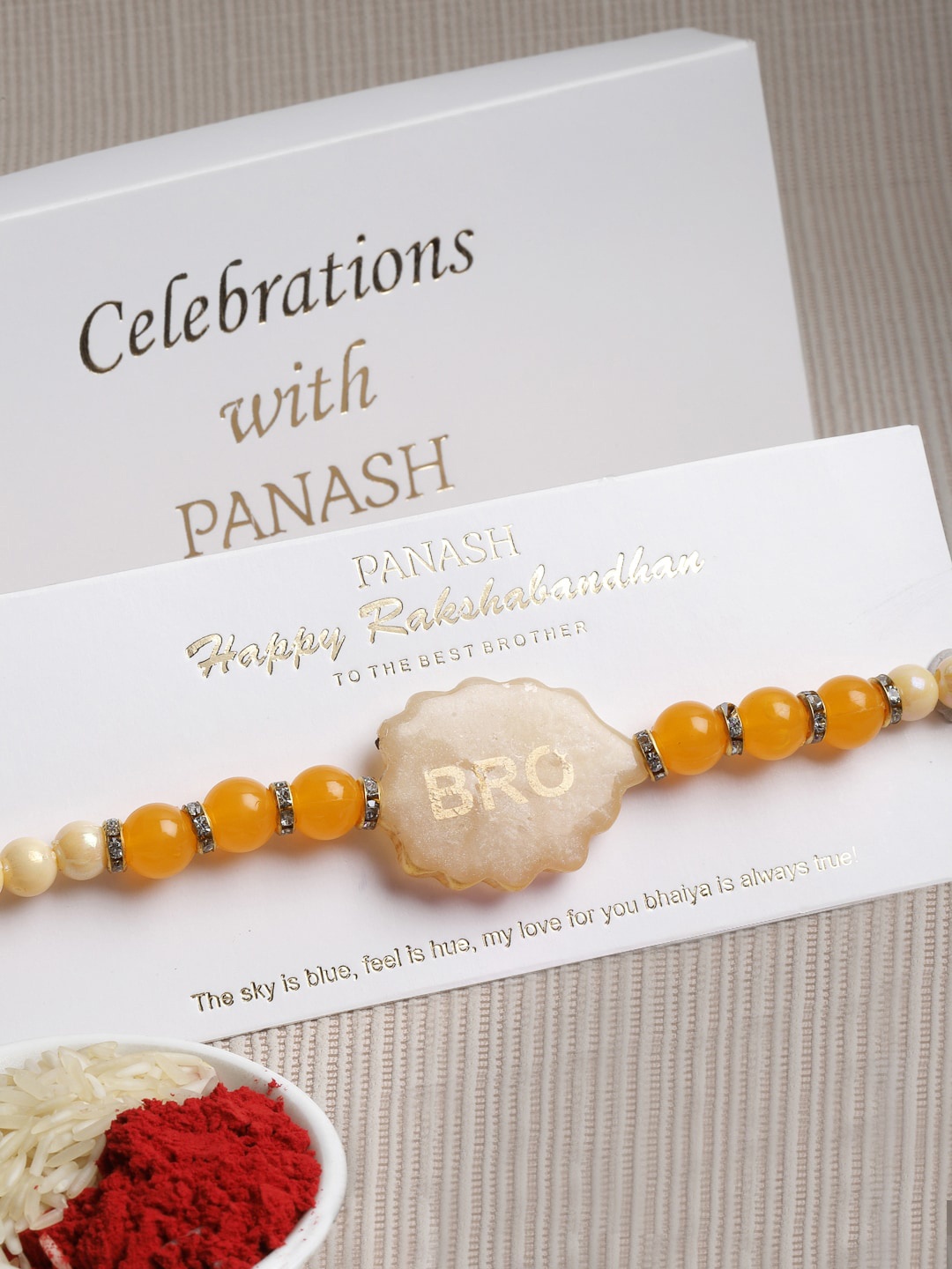 

PANASH Gold-Plated Yellow Pearls BRO Rakhi With Gift Stand