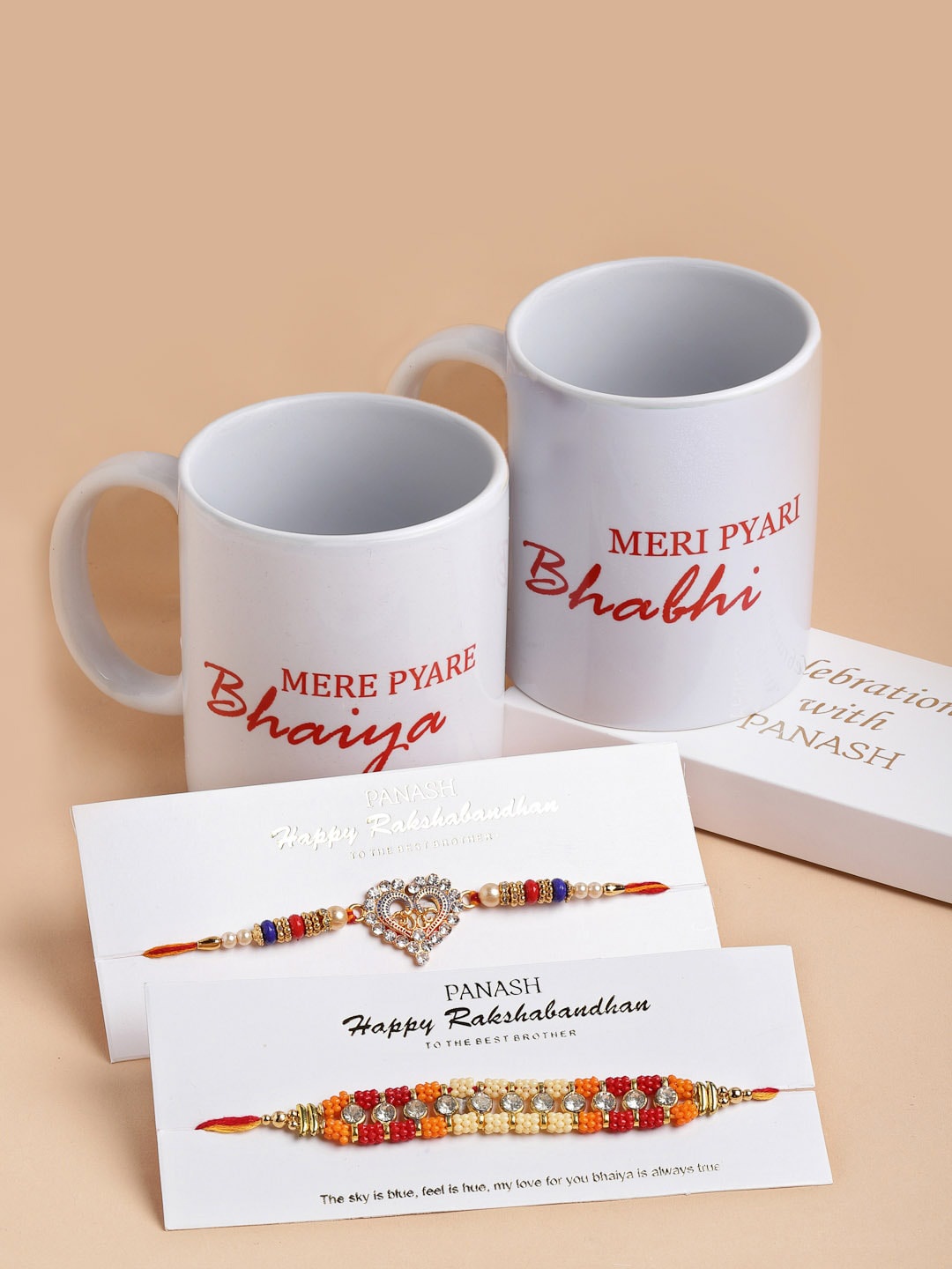 

PANASH Unisex Set Of 2 Gold-Toned Ad Stone & Beaded Rakhi with Bhaiya Bhabhi Mugs Gift Set