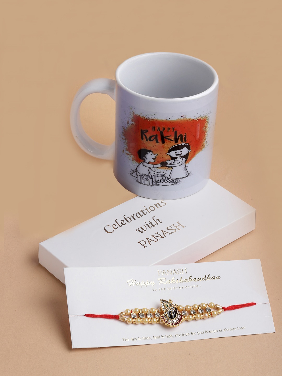 

PANASH Men Sri Krishna Pearl Rakhi With Mug Gift Set, Gold