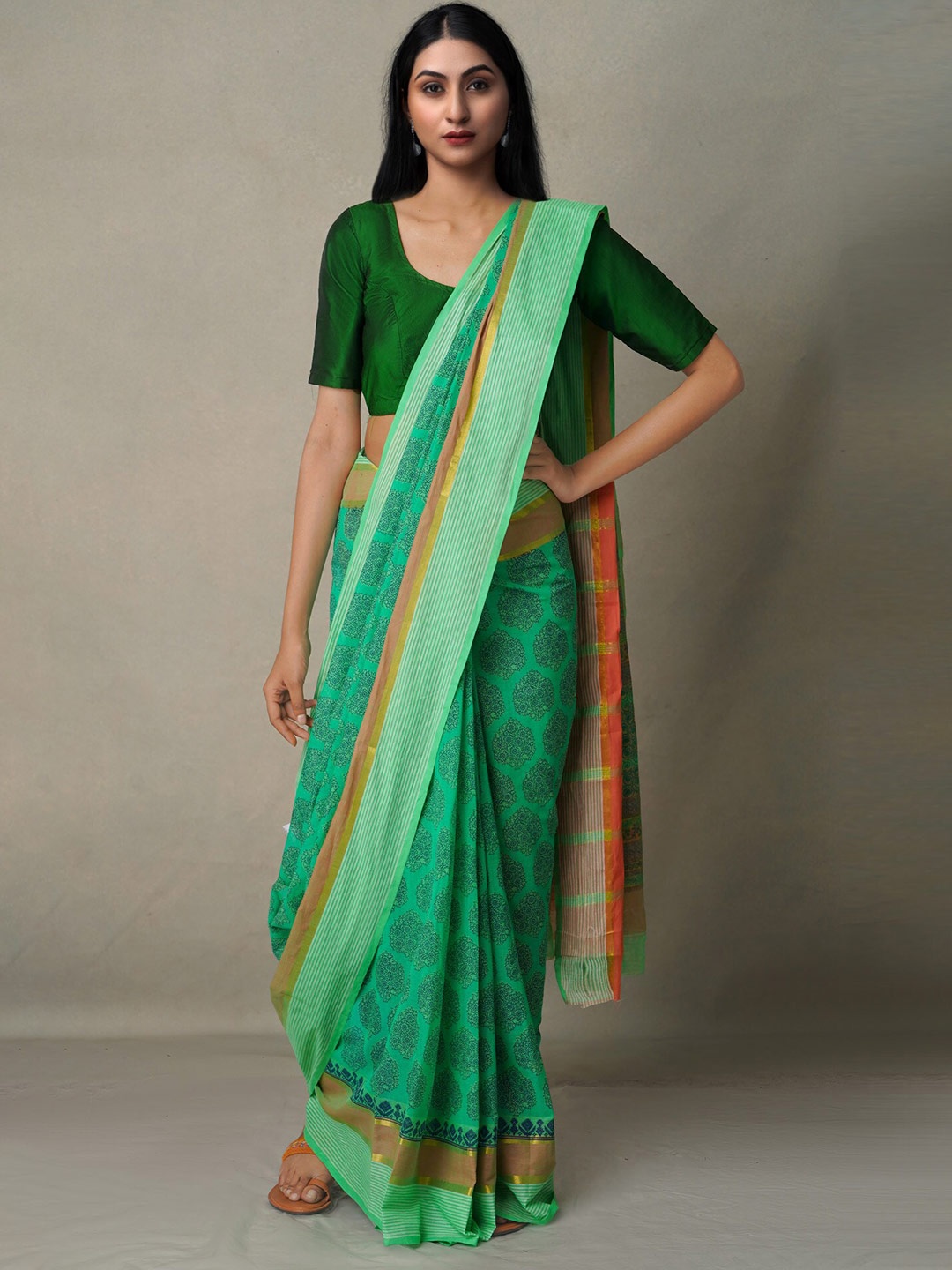 

Unnati Silks Green & Yellow Ethnic Motifs Zari Pure Cotton Mangalagiri Saree
