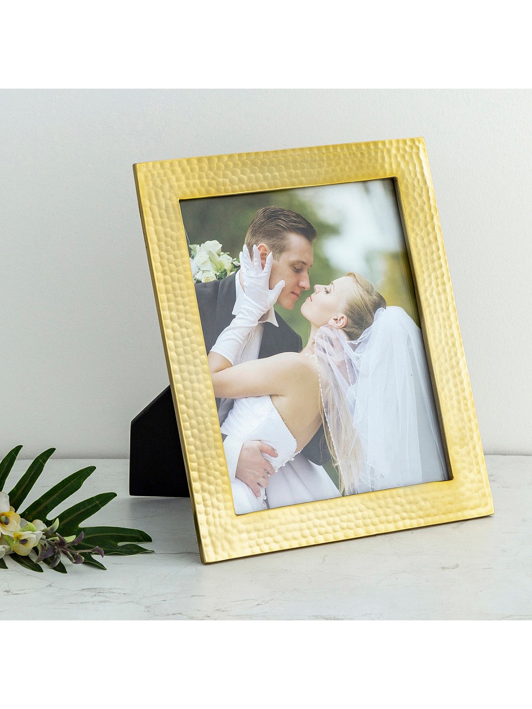 

Home Centre Gold-Colored Textured Photo Frames