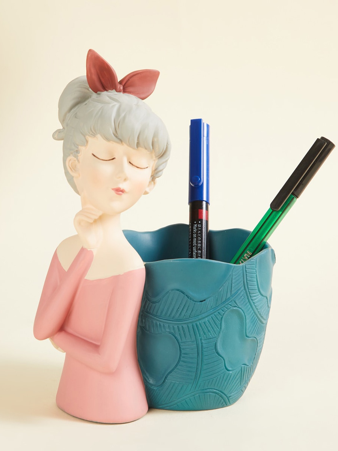 

Home Centre Pink & Blue Textured Polyresin Lady Figurine with Pen Holder