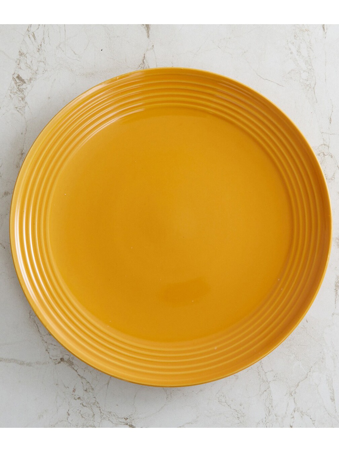

Home Centre Yellow & 1 Pieces Stoneware Glossy Plates