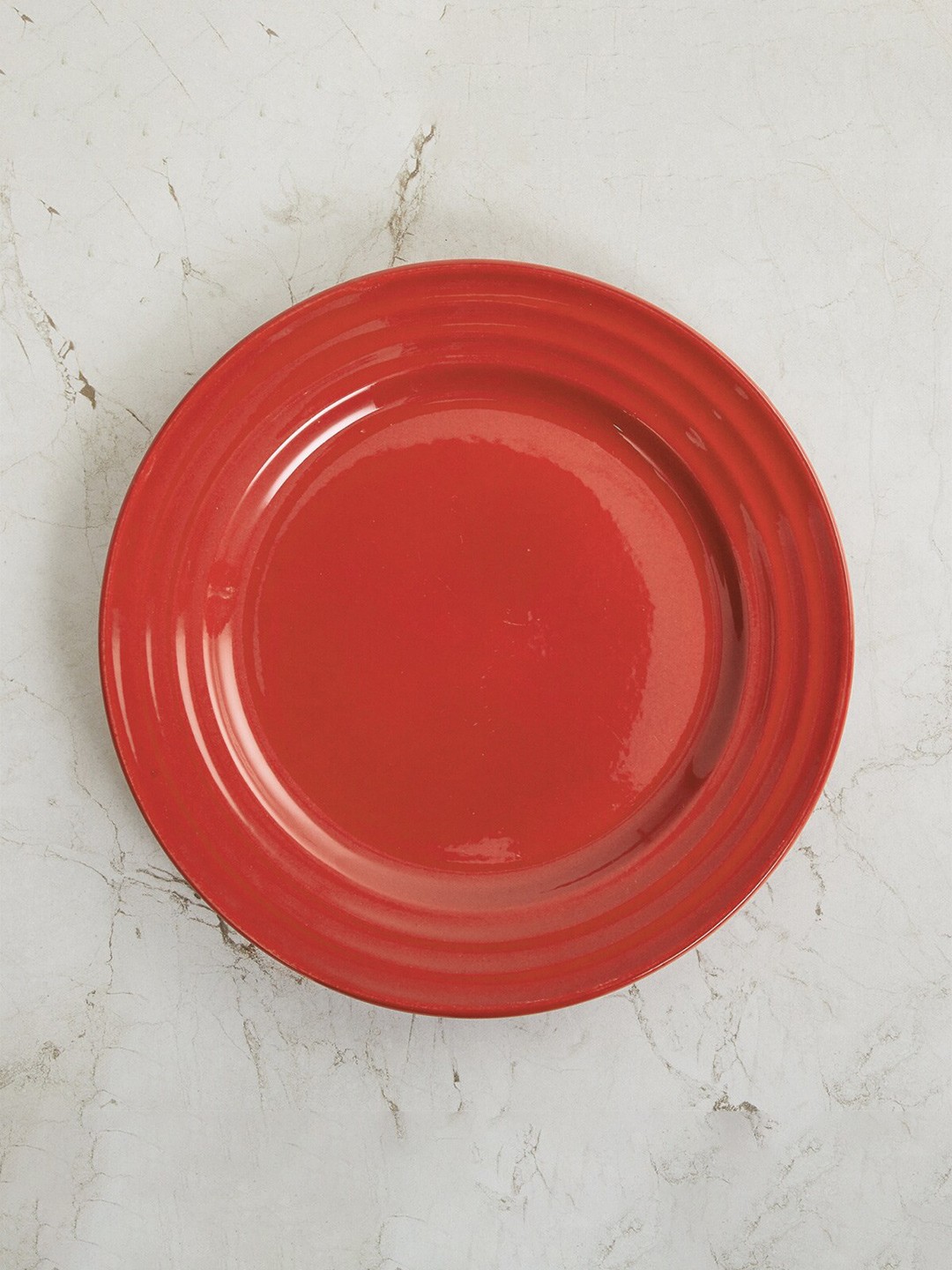 

Home Centre Red & 1 Pieces Bone China Glossy Plates