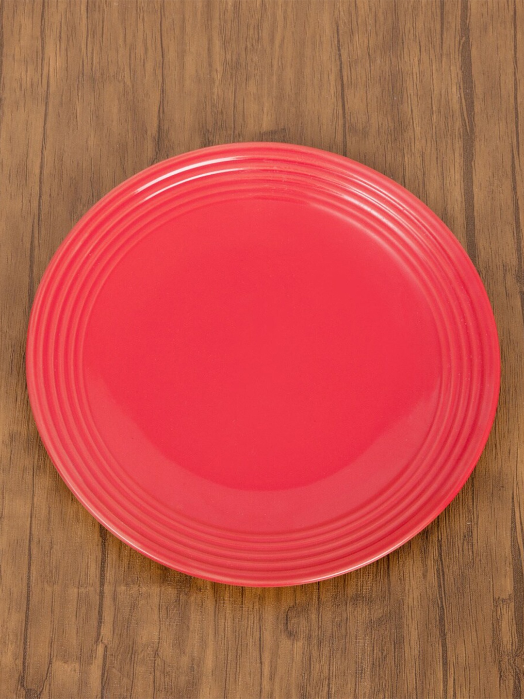 

Home Centre Red & 1 Pieces Stoneware Glossy Plates