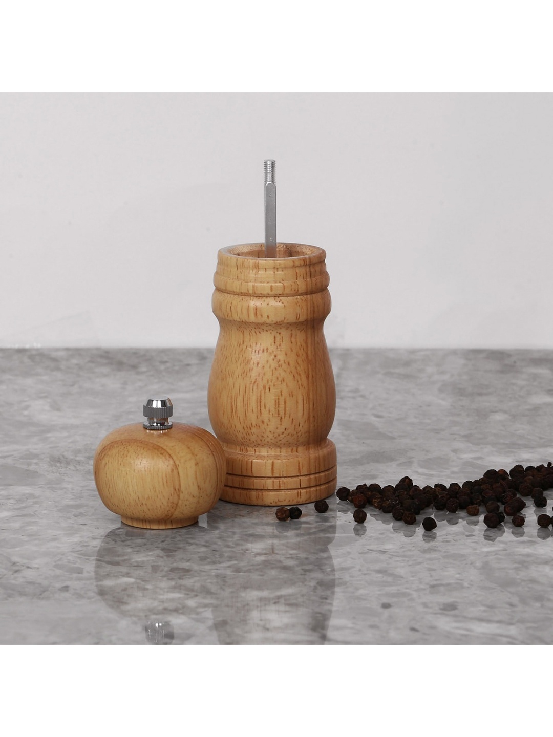 

Home Centre Brown Solid Wood Salt and Pepper Mill