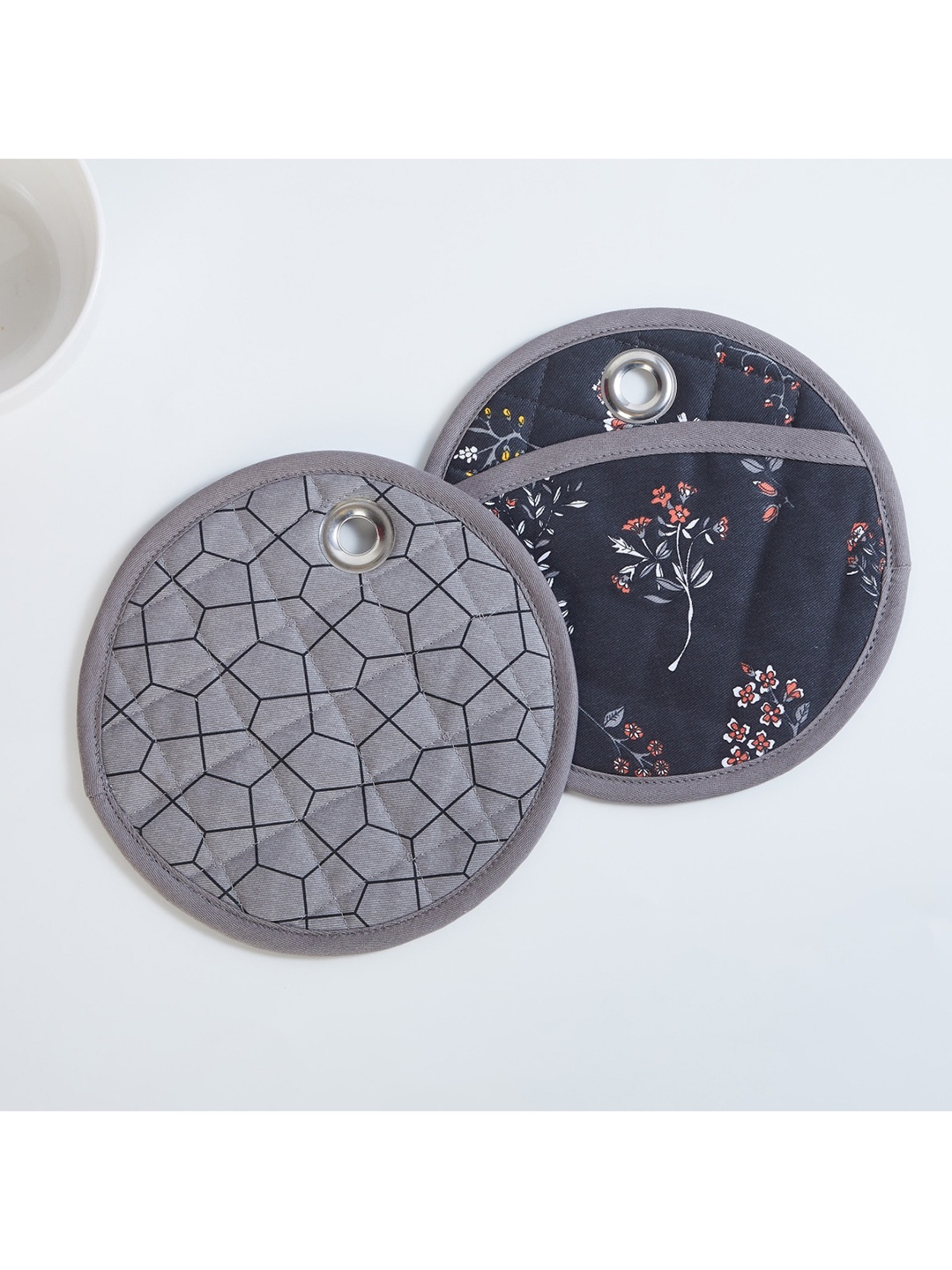 

Home Centre Set Of 2 Grey Mandarin-Modern Retreat Printed Round Pot Holders