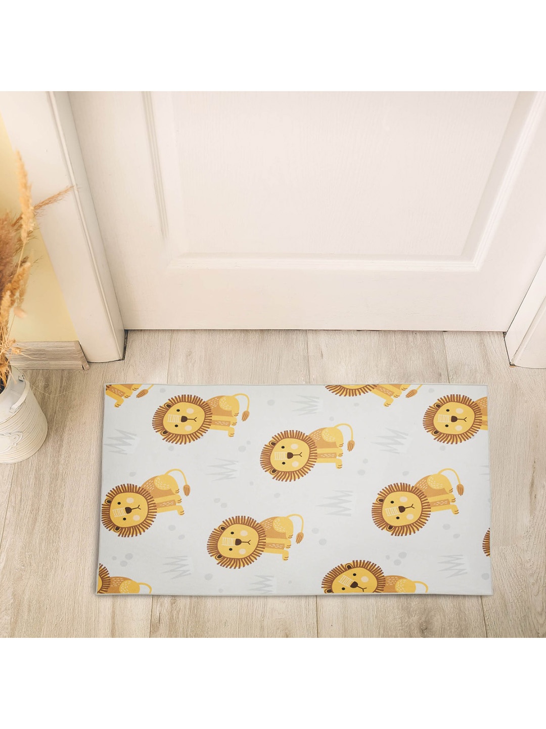 

Home Centre Grey & Yellow Lion Printed Fabric Carpet With Anti Slip Backing