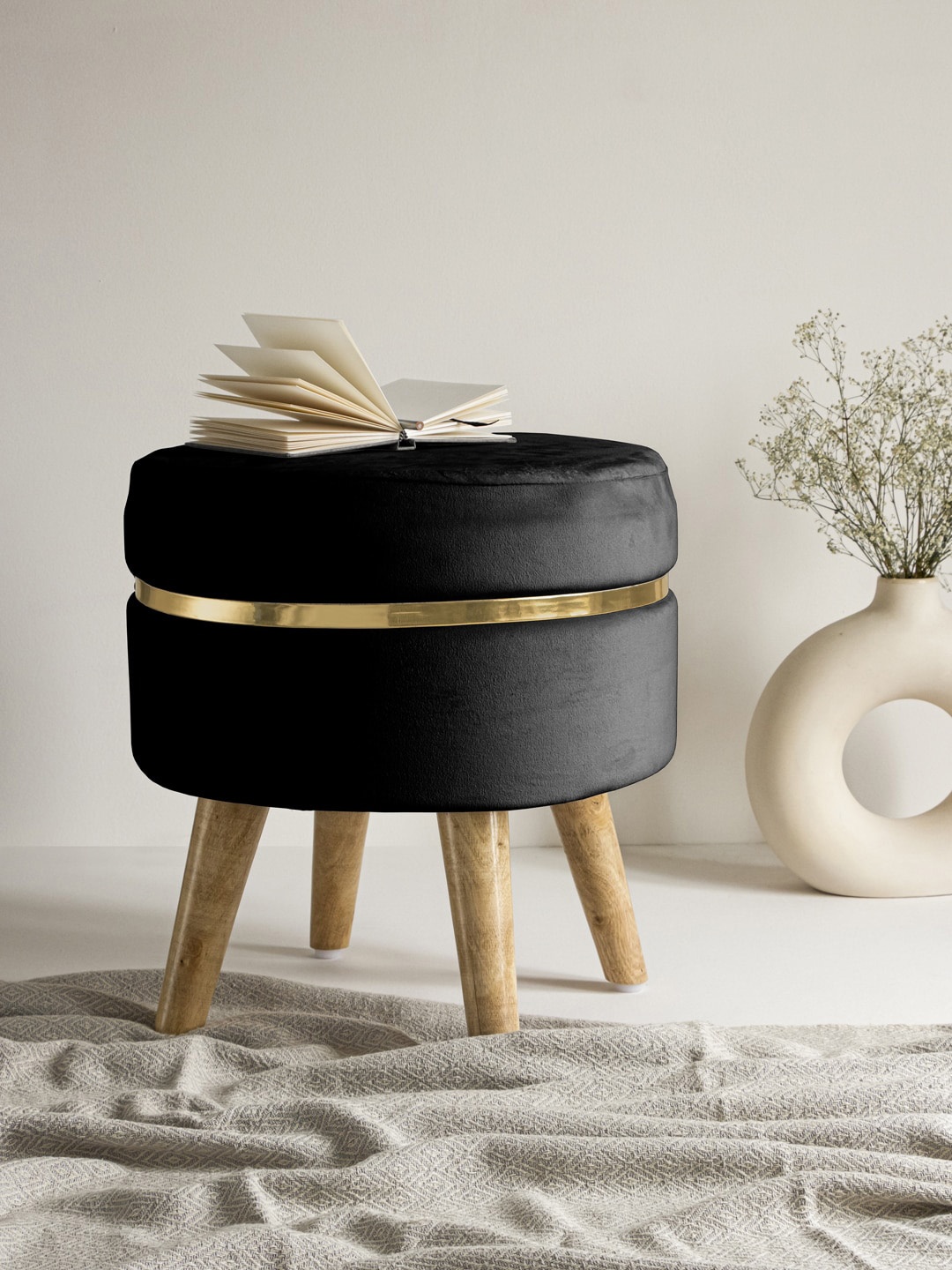 

Clasiko Black & Brown Solid Ottomans With Golden Ring & Wood Legs