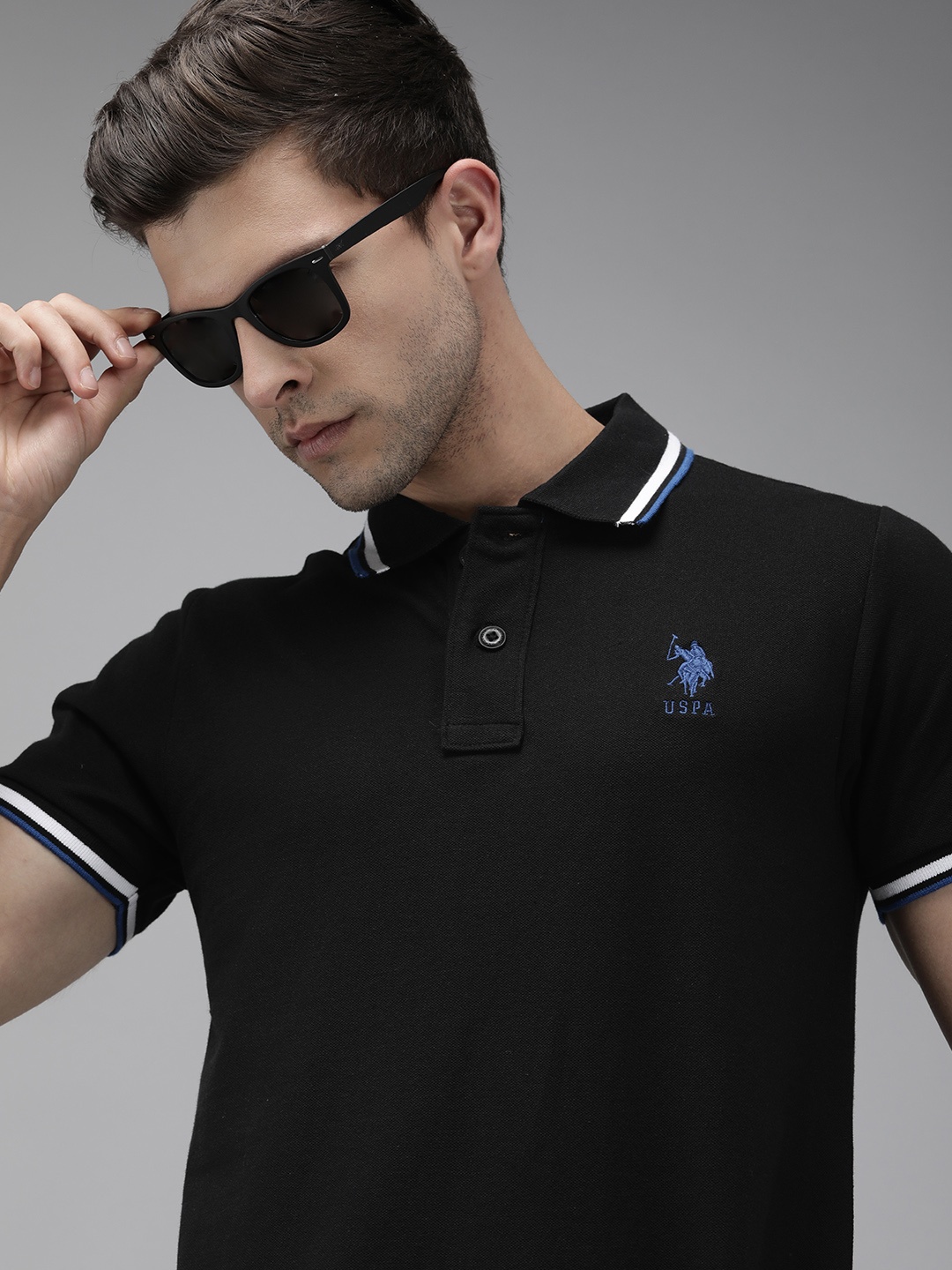 

U.S. Polo Assn. Men Black Solid Polo Collar T-shirt