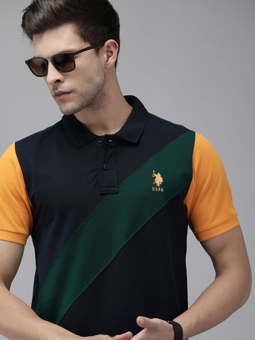 

U.S. Polo Assn. Men Green & Navy Blue Pure Cotton Colourblocked Polo Collar T-shirt