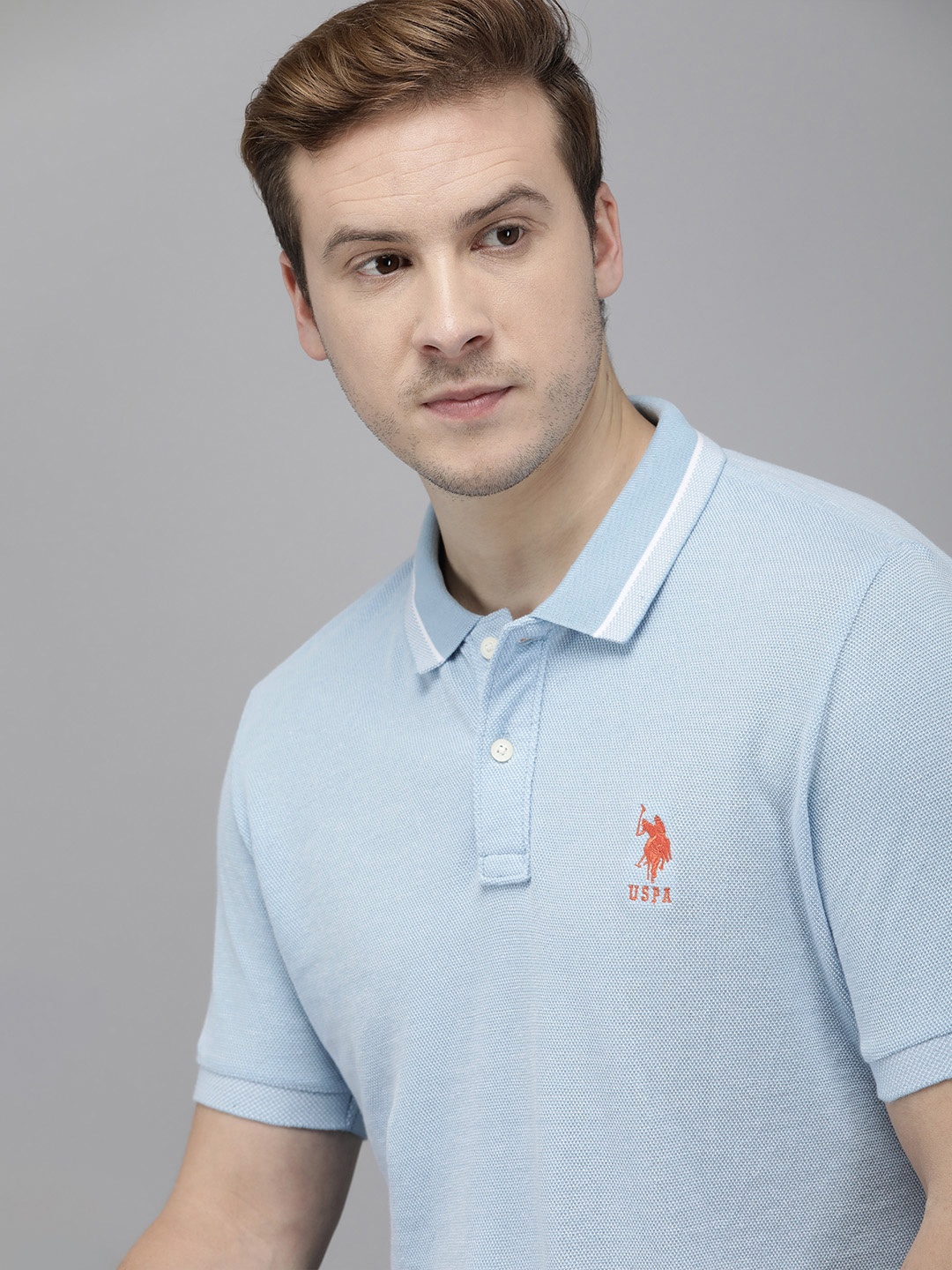 

U.S. Polo Assn. Men Blue Solid Pure Cotton Slim Fit T-shirt
