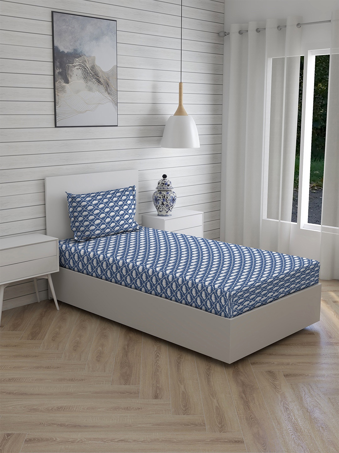 

Layers Blue & White Floral 144 TC Single Bedsheet with 1 Pillow Covers