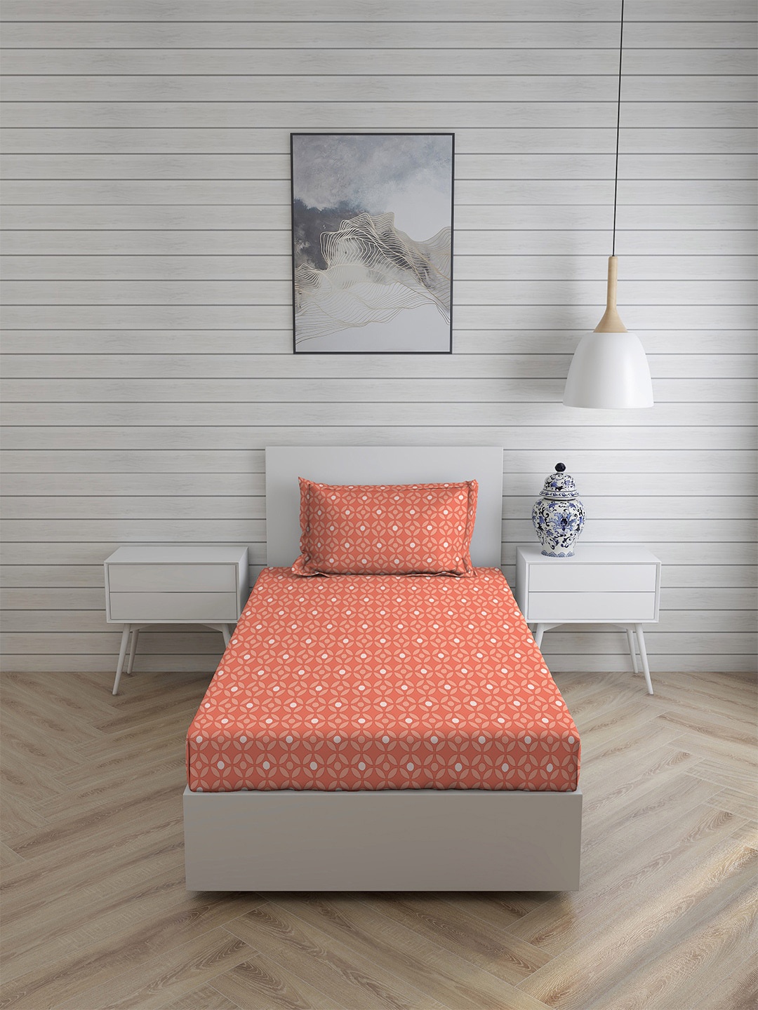 

Layers Orange & White Graphic 144 TC Single Bedsheet with 1 Pillow Covers