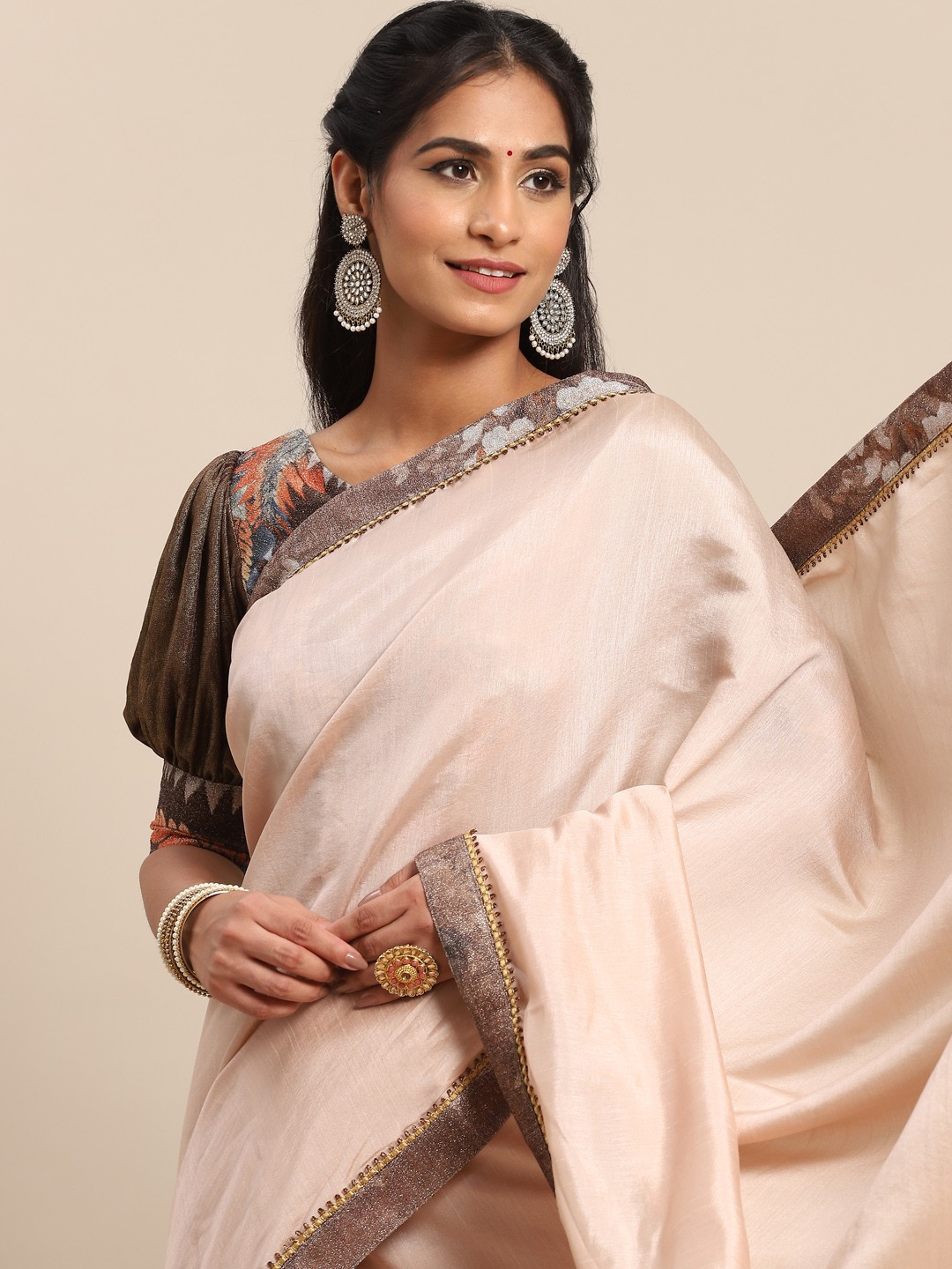 

Nimayaa Beige Solid Saree