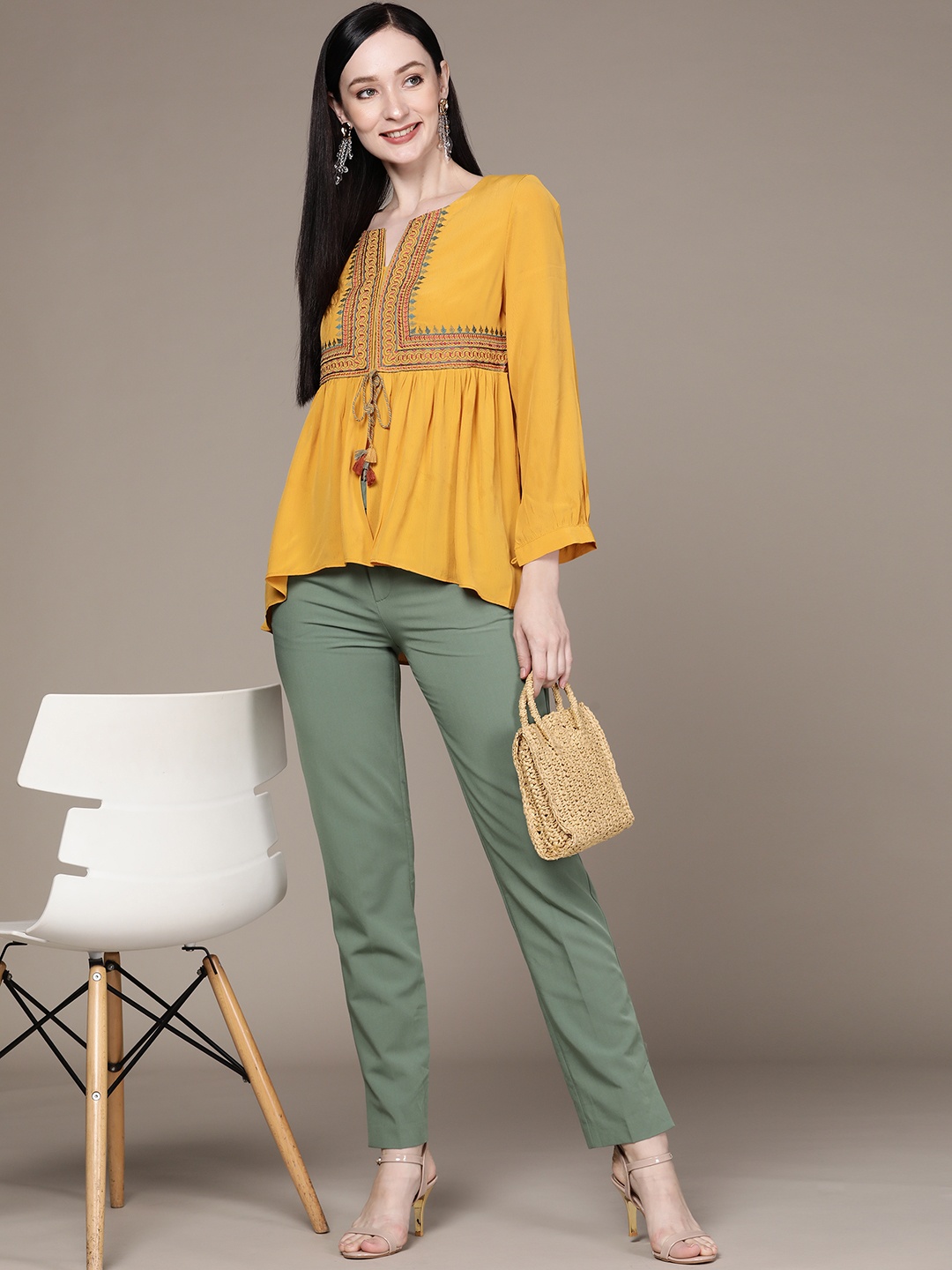 

aarke Ritu Kumar Yellow Embroidered Crepe Top