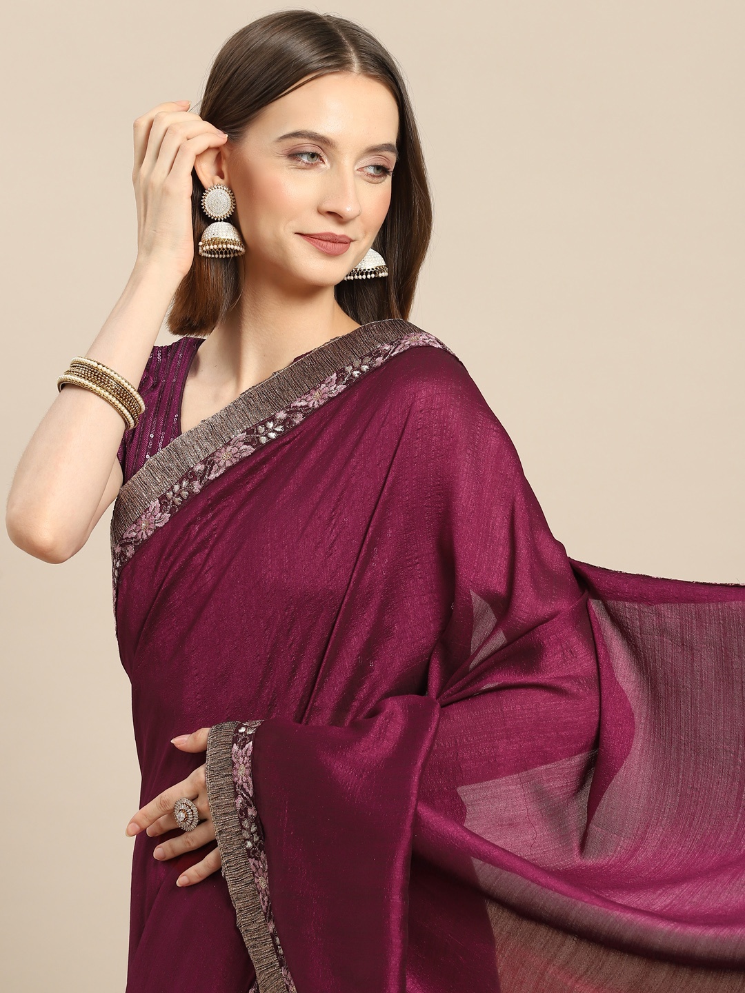 

Nimayaa Maroon Solid Saree