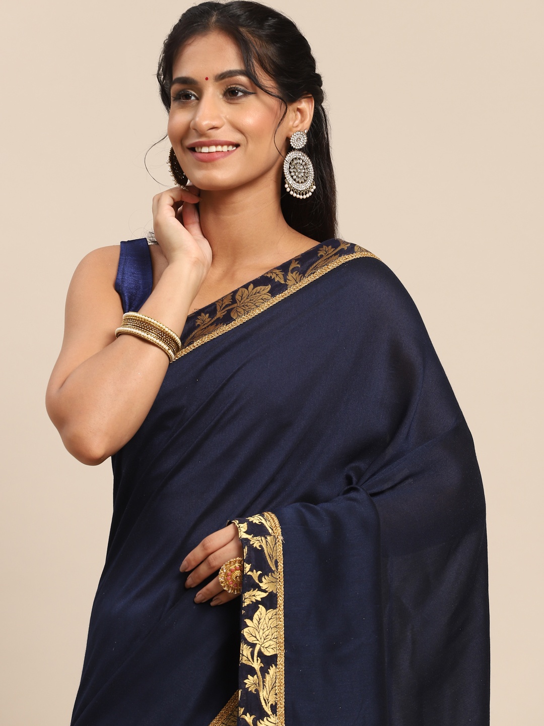 

Nimayaa Navy Blue Solid Zari Saree
