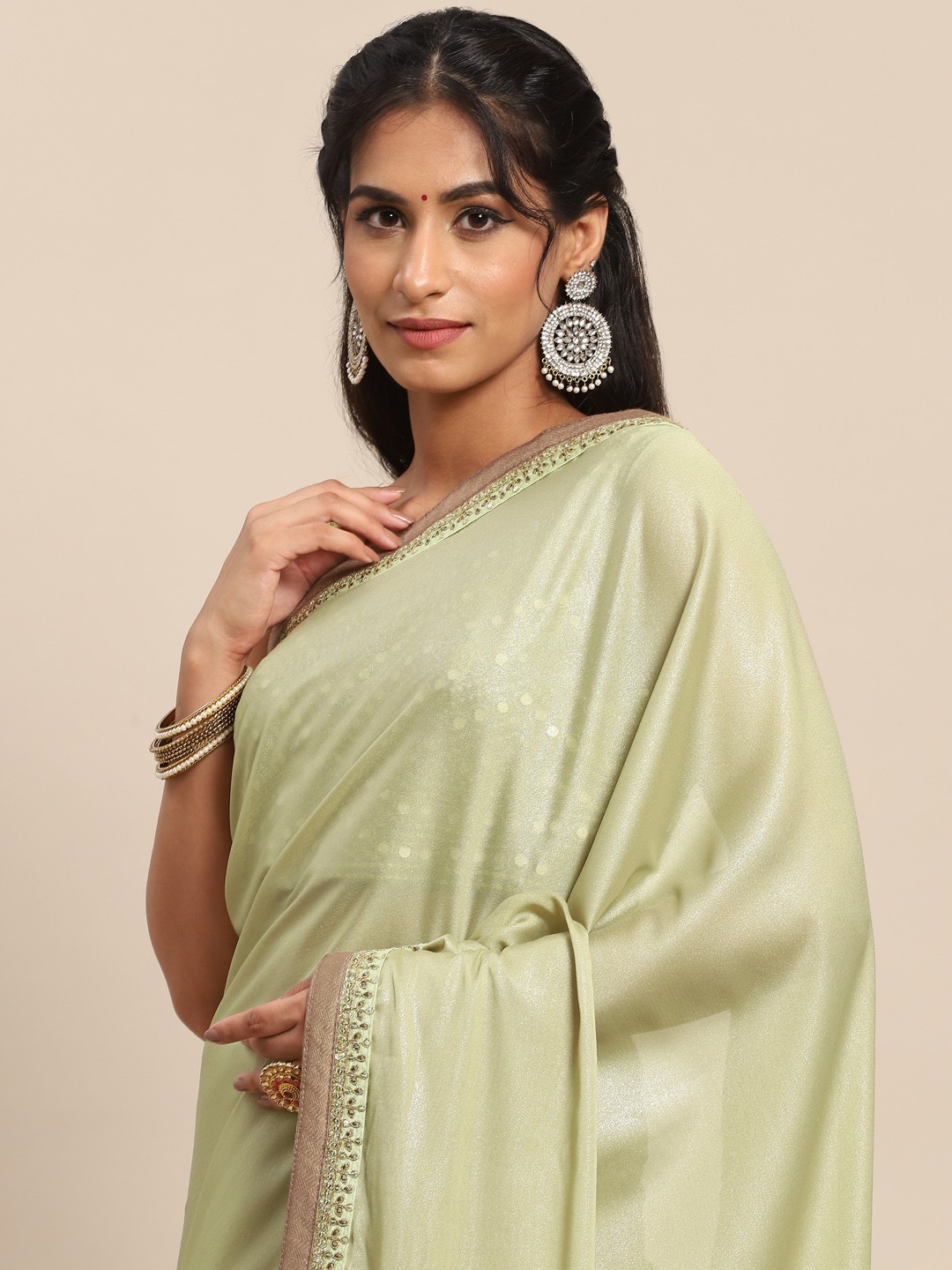 

Nimayaa Green Solid Zari Saree