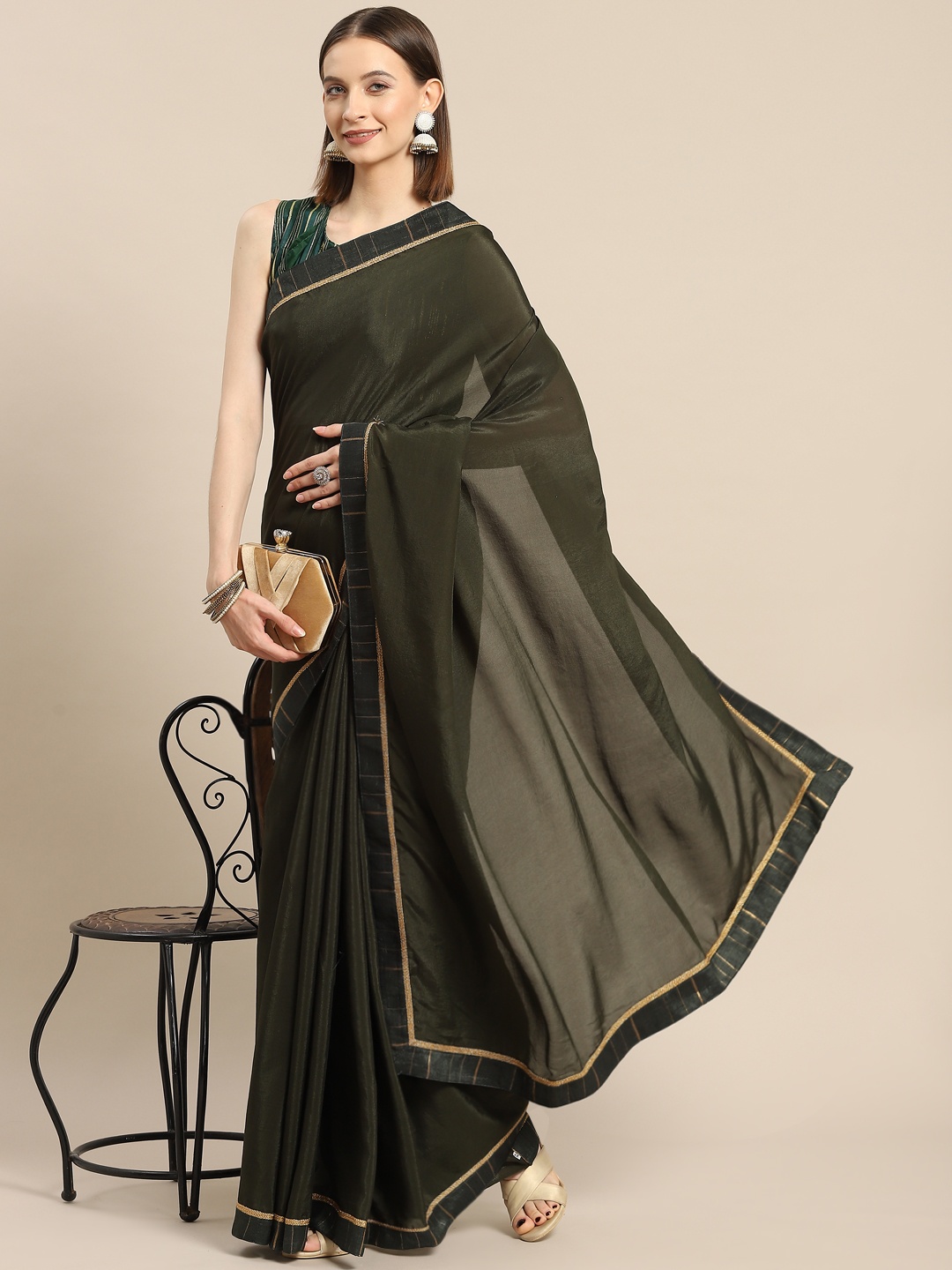 

Nimayaa Green Solid Saree