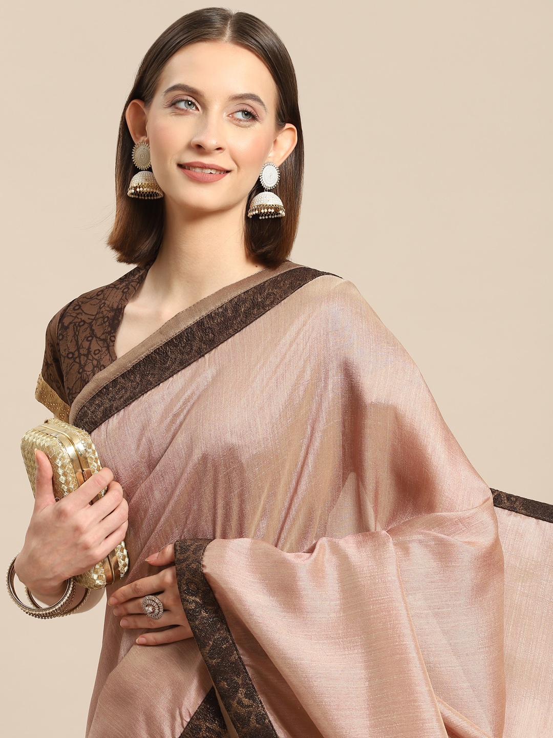 

Nimayaa Taupe Solid Saree