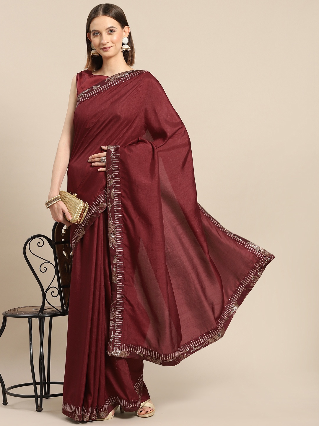 

Nimayaa Maroon Solid Zari Saree