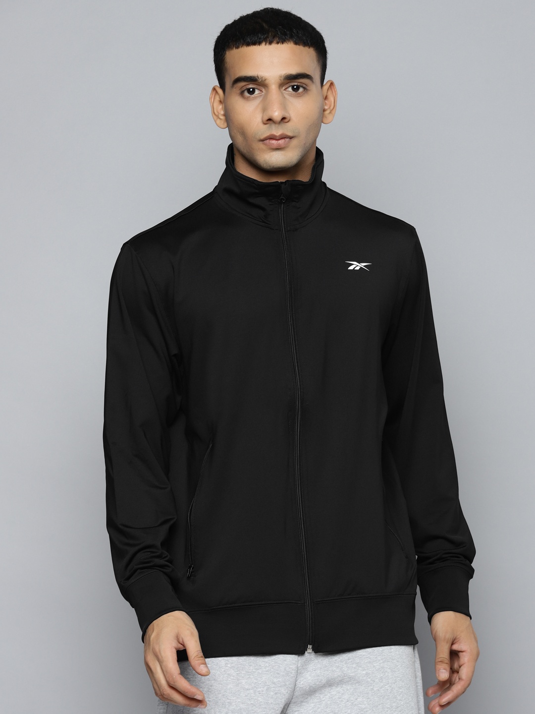 

Reebok Men Black Solid Training Sporty Jacket