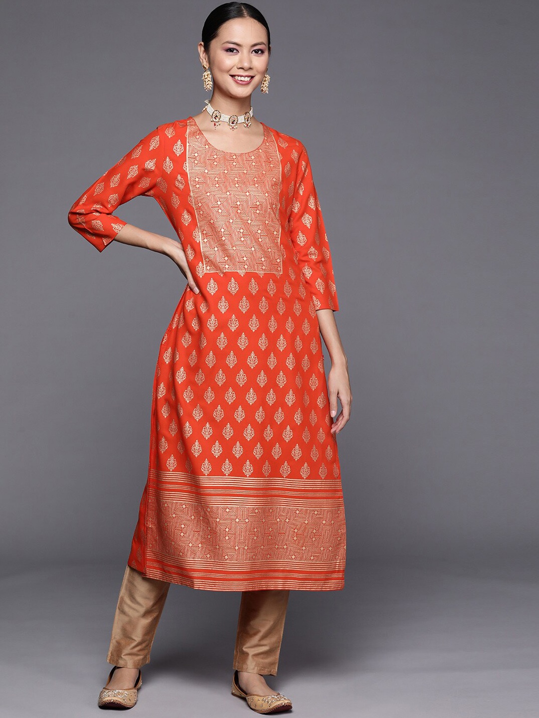 

Varanga Women Orange Ethnic Motifs Kurta